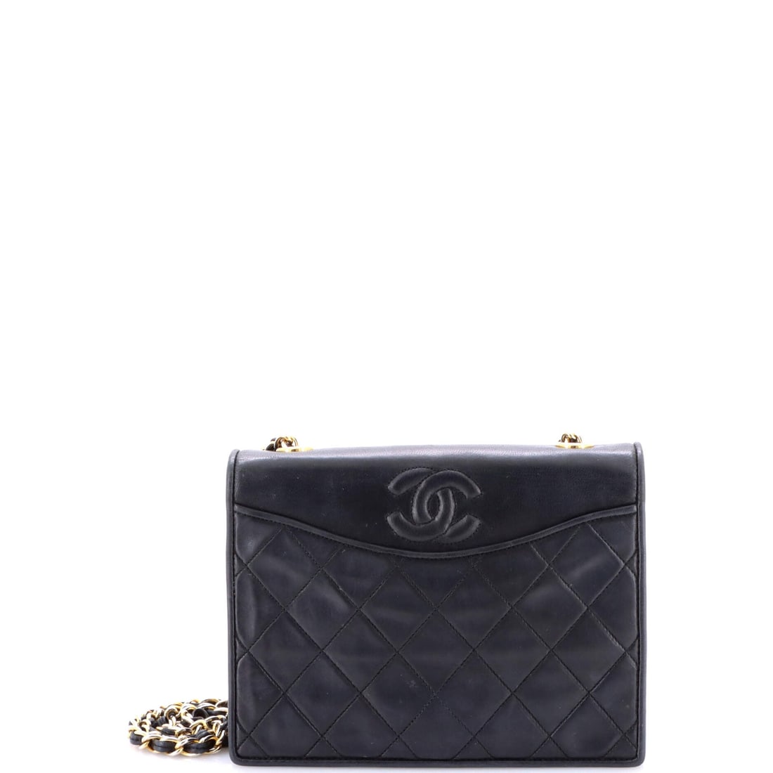 Chanel Vintage CC Full Flap Bag Quilted Lambskin: Chanel's Vintage CC Full Flap Bag, cut in quilted lambskin. A clean-lined handbag built for everyday carry. Footprint is 8"W x 5"H x 2"D. Structured enough to mean business, sized for everyday. Grade 