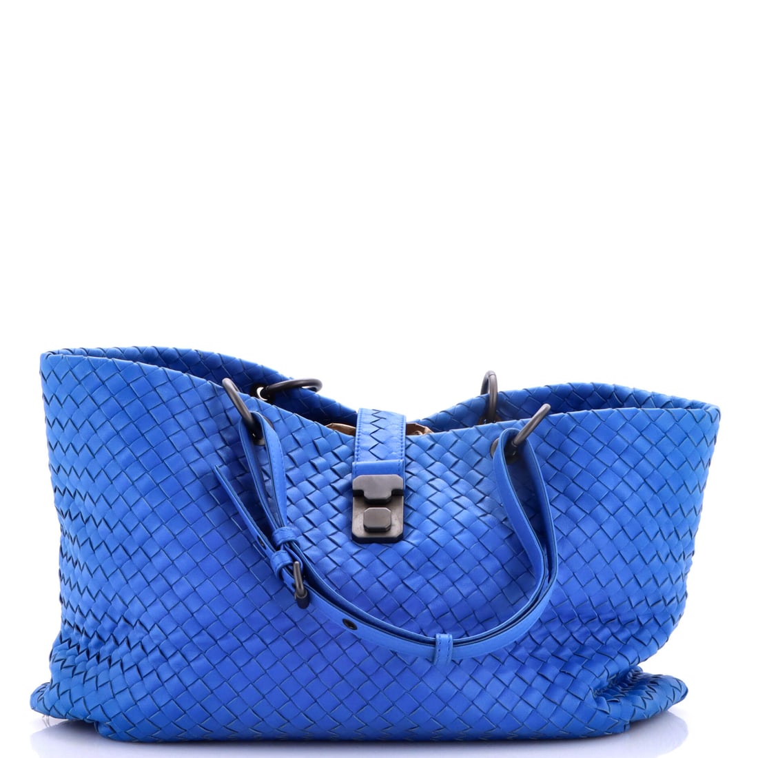 Bottega Veneta Capri Tote Intrecciato Nappa: Intrecciato nappa defines this Bottega Veneta Capri Tote. An open tote with a roomy, upright body. Sized at 14"W x 9.5"H x 6"D, 8" handle drop. The kind of bag that disappears into daily use and