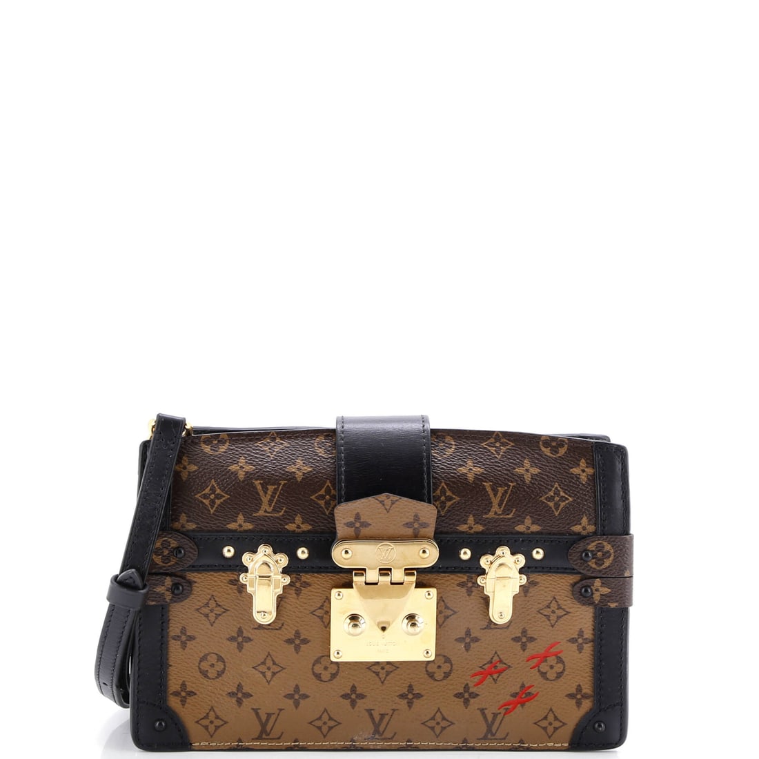 Louis Vuitton Trunk Clutch Reverse Monogram Canvas: Louis Vuitton's Trunk Clutch, cut in reverse Monogram canvas. A trunk-inspired clutch with crisp, architectural edges and a compact footprint. 8.5"W x 6"H x 3"D, 23" strap drop, so the scale is easy t