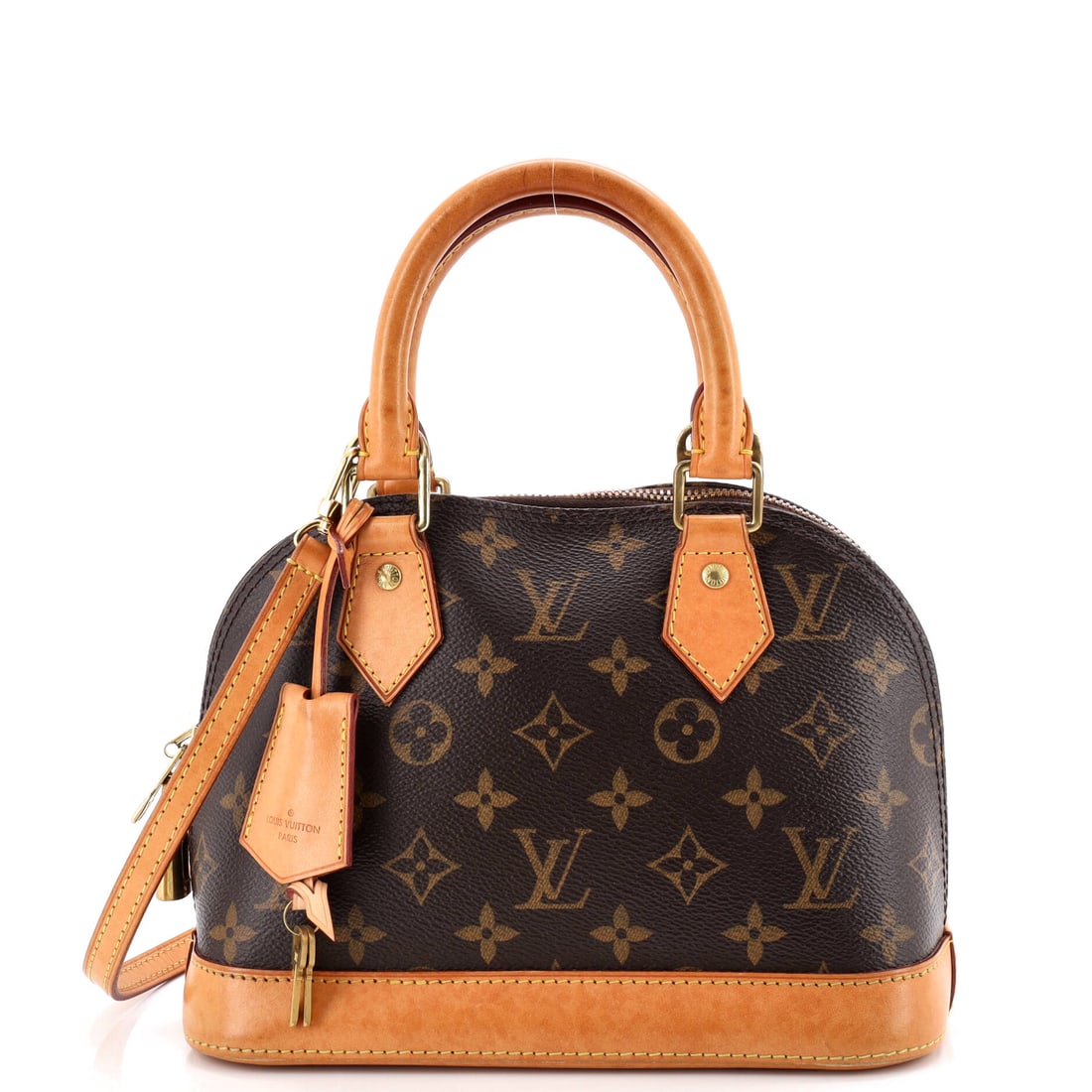 Louis Vuitton Alma Handbag Monogram Canvas: Louis Vuitton's Alma Handbag in Monogram canvas. The curved top and structured base read sharp on the arm and tidy on a desk. It measures 9"W x 7"H x 4.5"D, 3.5" handle drop and 21.5" strap drop.