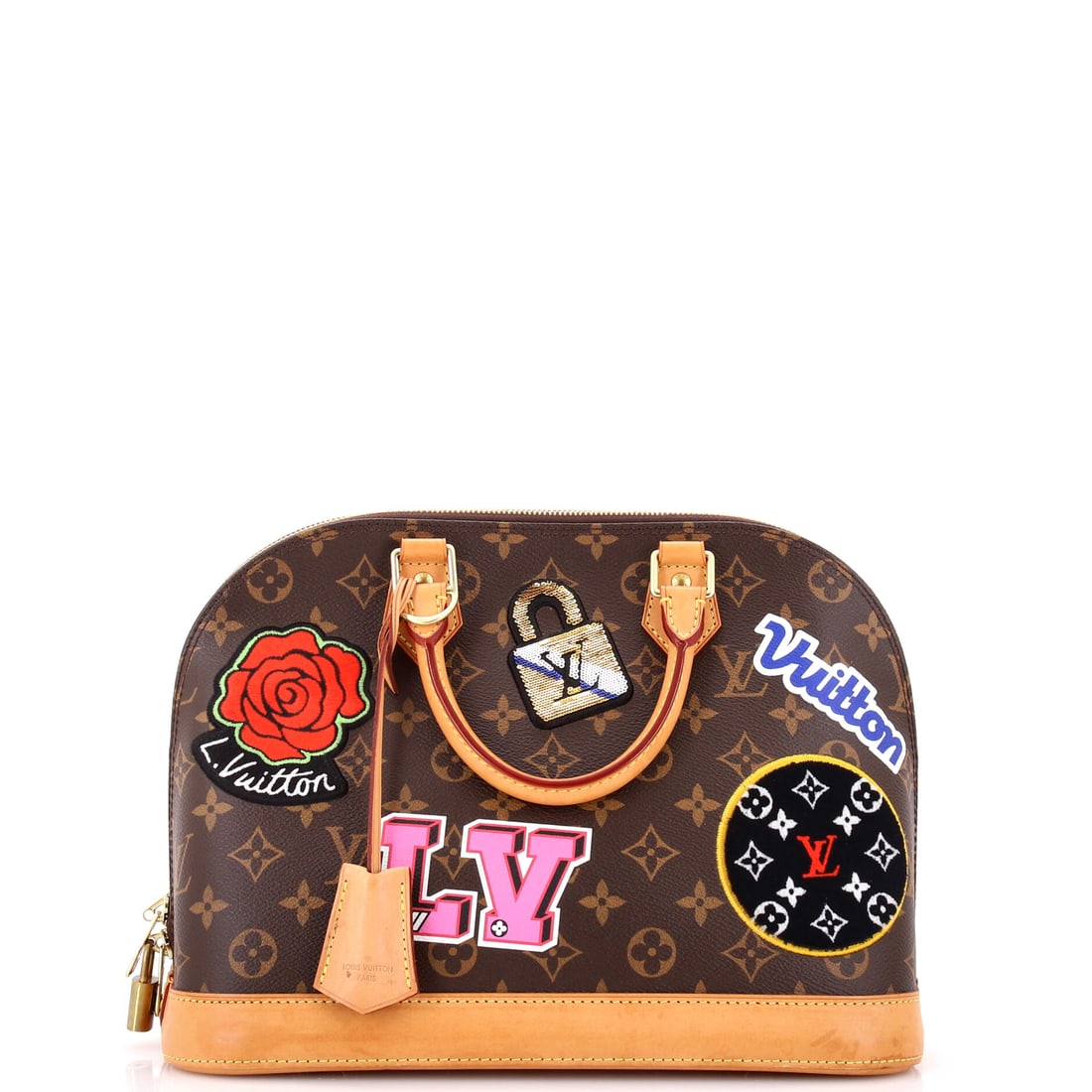 Louis Vuitton Alma Handbag Limited Edition Patches Monogram Canvas: The Louis Vuitton Alma Handbag. Its architectural curve and rigid frame give it a polished, stand-up presence. It carries at 12"W x 9.5"H x 6"D, 4" handle drop. In Grade C - Very Good condition. Maiso