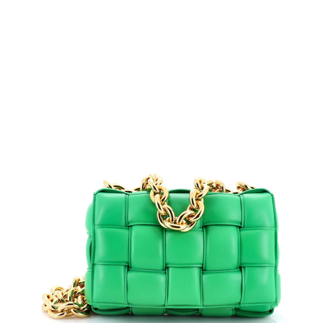 Bottega Veneta Cassette Chain Crossbody Bag Padded Maxi Intrecciato Leather: Here, the Bottega Veneta Cassette Chain Crossbody Bag. The pillowed weave reads as texture from across a room, no logo required. It carries at 9.5"W x 7"H x 2"D, 5.5" handle drop and 20.5" strap drop.