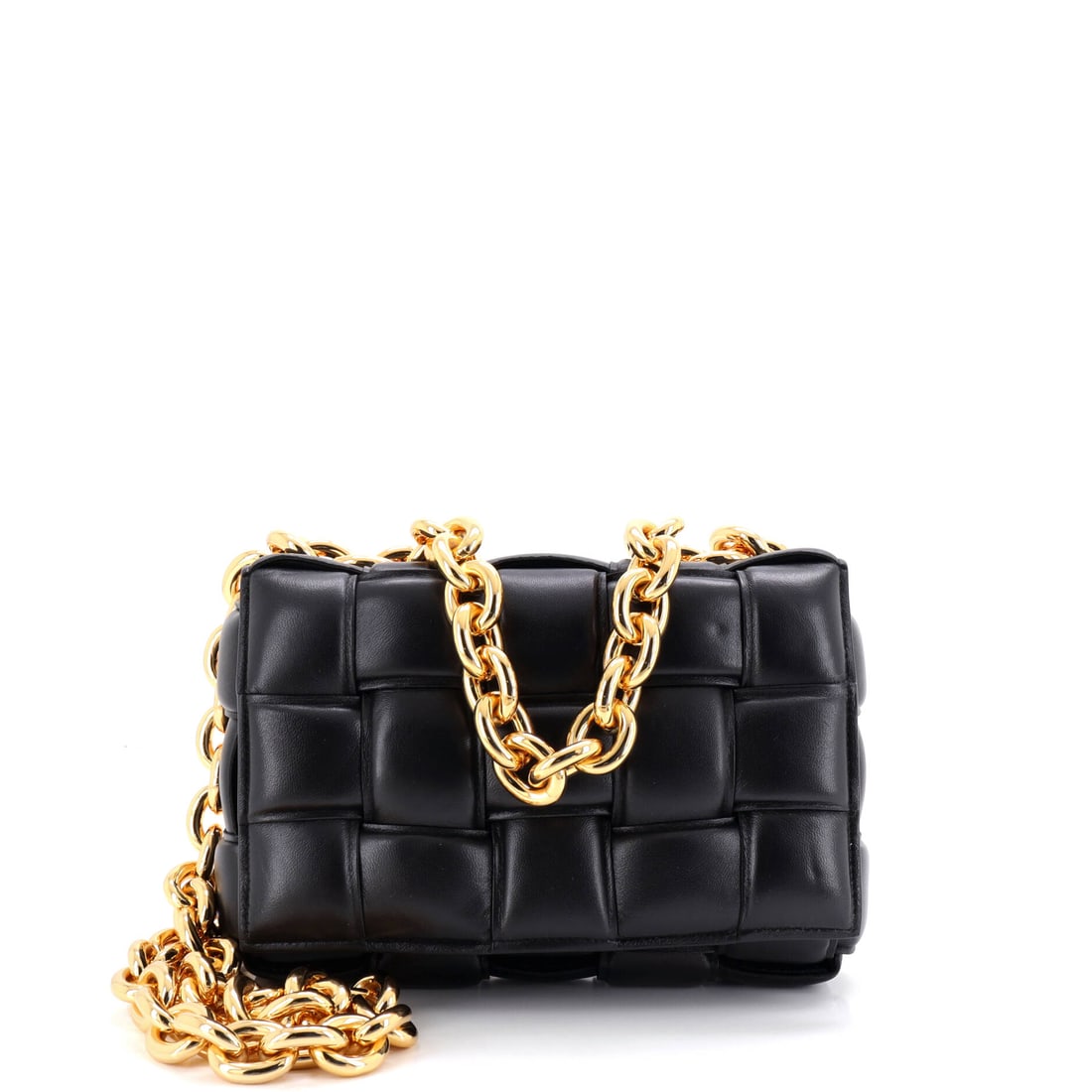 Bottega Veneta Cassette Chain Crossbody Bag Padded Maxi Intrecciato Leather: The Bottega Veneta Cassette Chain Crossbody Bag. A compact, cushioned crossbody that has become Bottega shorthand in its own right. Scale sits at 10"W x 7"H x 2"D, 5.5" handle drop and 20.5" strap dro
