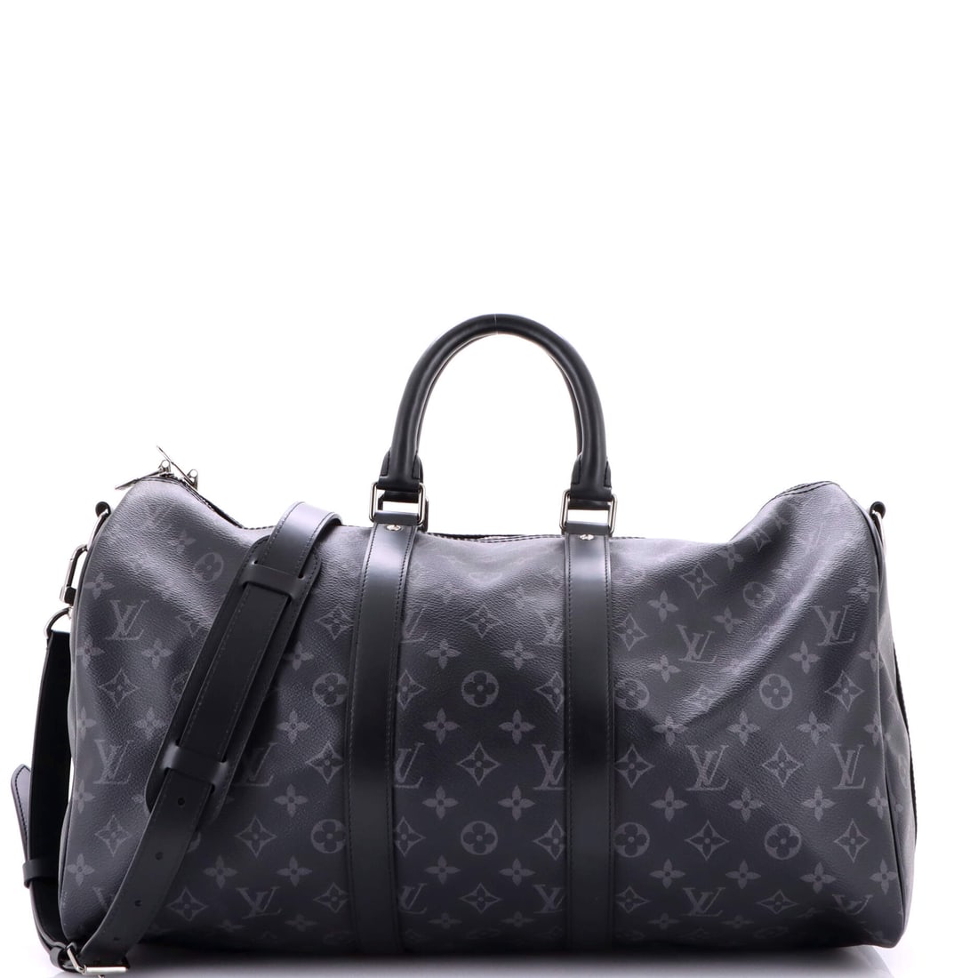 Louis Vuitton Keepall Bandouliere Bag Monogram Eclipse Canvas: Monogram Eclipse canvas, on a Louis Vuitton Keepall Bandouliere Bag. Strap on, it is an airport bag; strap off, a clean overnight duffel. Sized at 17.5"W x 11"H x 8"D, 4.5" handle drop and 20" strap d