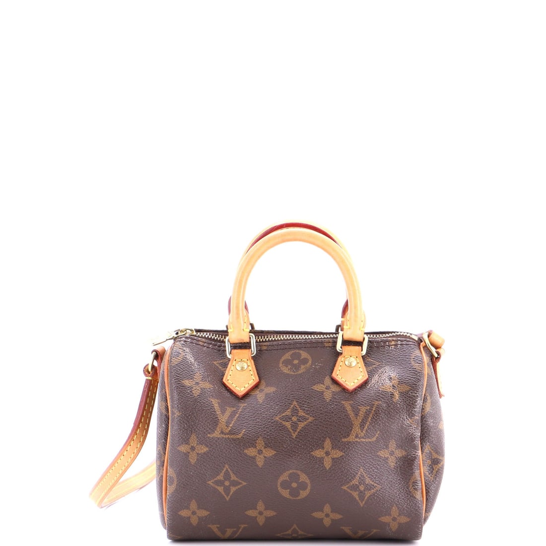 Louis Vuitton Speedy Bandouliere Bag Monogram Canvas: Monogram canvas defines this Louis Vuitton Speedy Bandouliere Bag. Rounded, top-zip and now strap-ready, it covers errands and travel in one shape. At 6"W x 4"H x 4"D, 2" handle drop and 21" strap dro