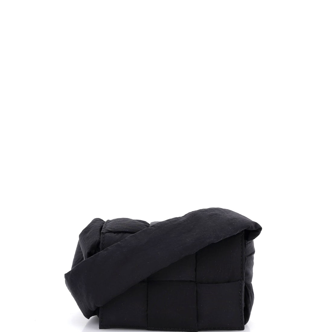 Bottega Veneta Cassette Crossbody Bag Maxi Intrecciato Nylon: A Bottega Veneta Cassette Crossbody Bag in maxi Intrecciato nylon. The quilted-weave panels and slim strap make it one of the most recognizable shapes Bottega makes today. Scale sits at 4.5"W x 3.5"H 