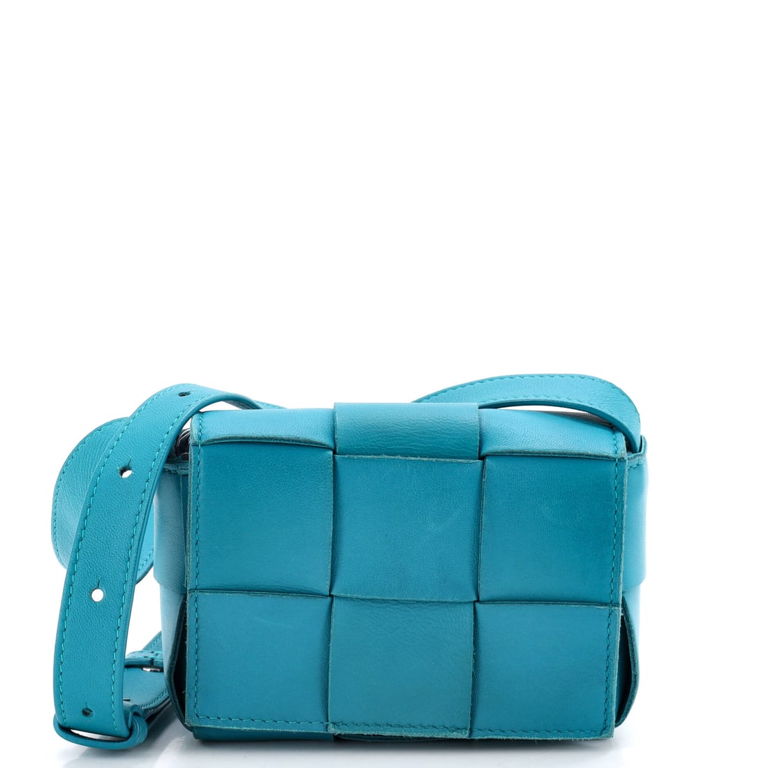 Bottega Veneta Cassette Crossbody Bag Maxi Intrecciato Leather: Bottega Veneta's Cassette Crossbody Bag in maxi Intrecciato leather. The quilted-weave panels and slim strap make it one of the most recognizable shapes Bottega makes today. It measures 5"W x 3.5"H x 