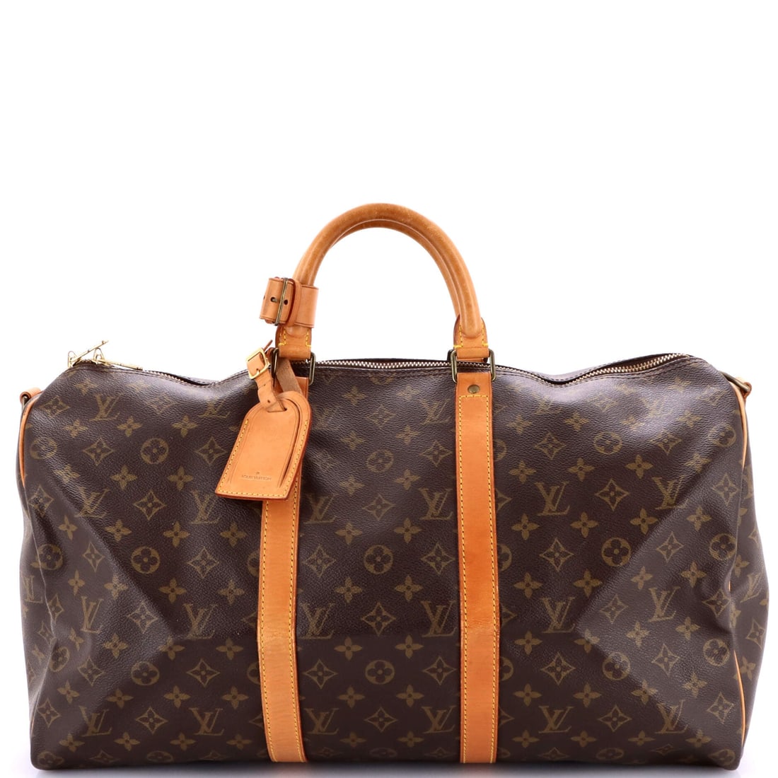 Louis Vuitton Keepall Bandouliere Bag Monogram Canvas: Monogram canvas defines this Louis Vuitton Keepall Bandouliere Bag. Soft-sided and strap-ready, it folds down between trips and holds its line when packed. 20"W x 11"H x 9"D, 4.5" handle drop and 20" 