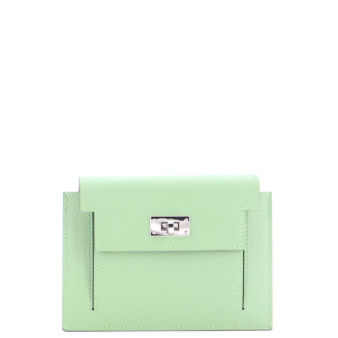 Hermes Kelly Pocket Compact Wallet Epsom: A compact wallet with a Kelly's front furniture is a particular kind of object - the strap, plaque and turnlock all work, so opening it repeats the gesture of opening the bag. Epsom calfskin keeps the