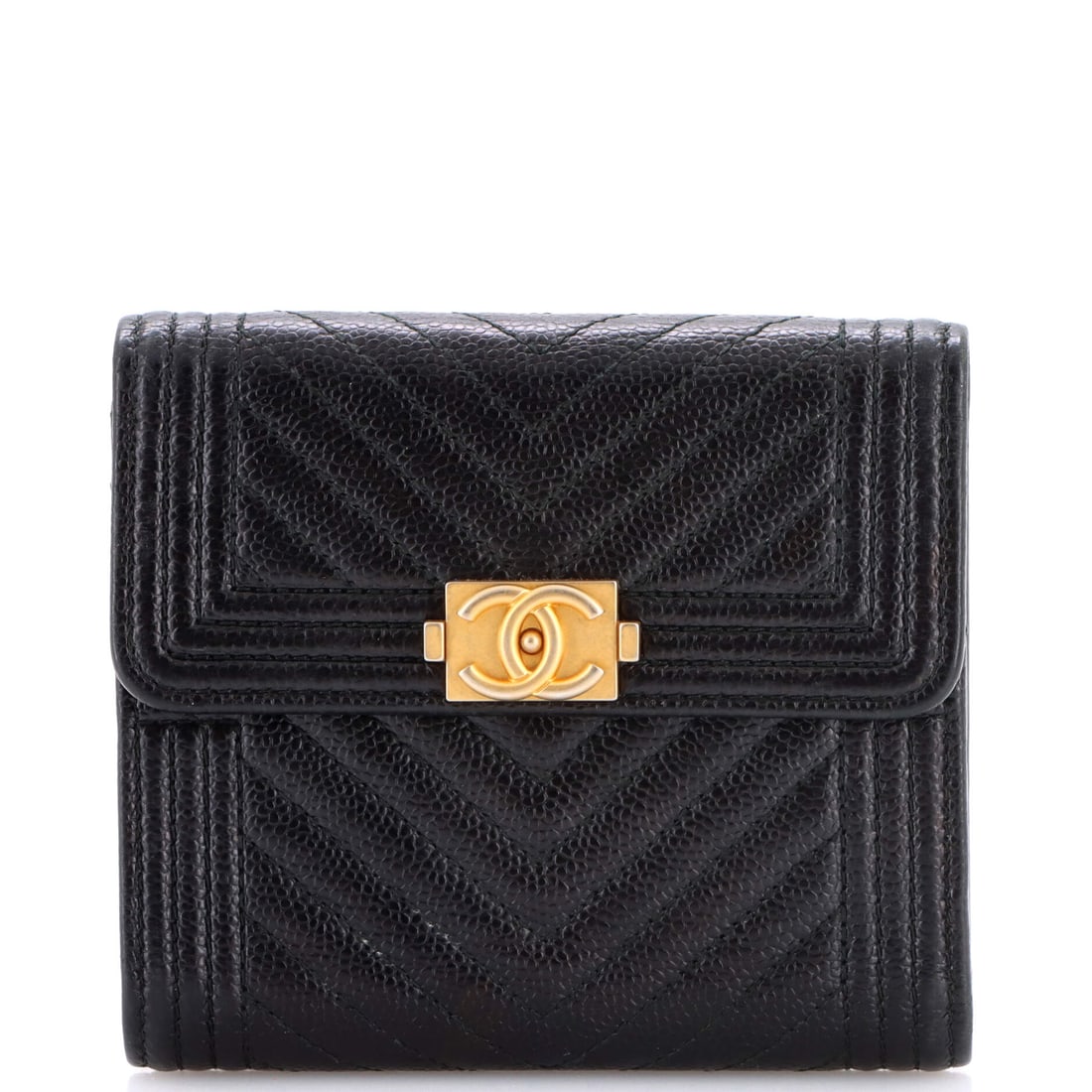 Chanel Boy Trifold Flap Wallet Chevron Caviar: Chevron rather than diamond quilting gives this small Boy wallet a directional, harder-edged surface, and caviar calfskin holds those lines crisply. Trifold construction packs card slots, a note secti