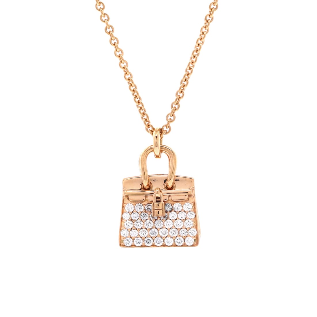 Hermes Birkin Amulette NM Pendant Necklace 18K Rose Gold and Diamonds: Hermes Birkin Amulette in 18K rose gold set with diamonds, the Birkin's cadena reduced to a pendant. At this scale the lock form is the entire design. Chain length runs 15 to 15.75 inches and the pend
