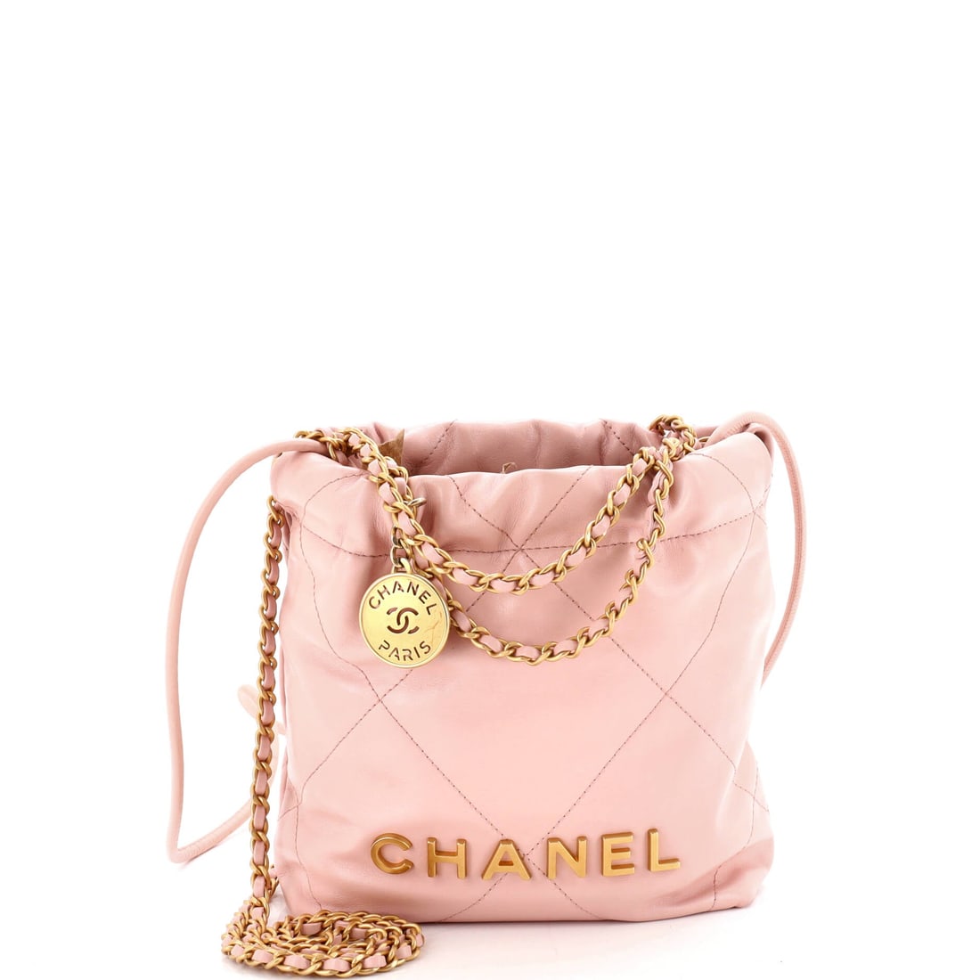 Chanel 22 Chain Hobo Quilted Calfskin: Chanel 22 chain hobo in quilted calfskin, with the CC-stamped medallion charm at the drawstring. Quilting here is tonal rather than raised, keeping attention on the silhouette. Scale here is the Mini: