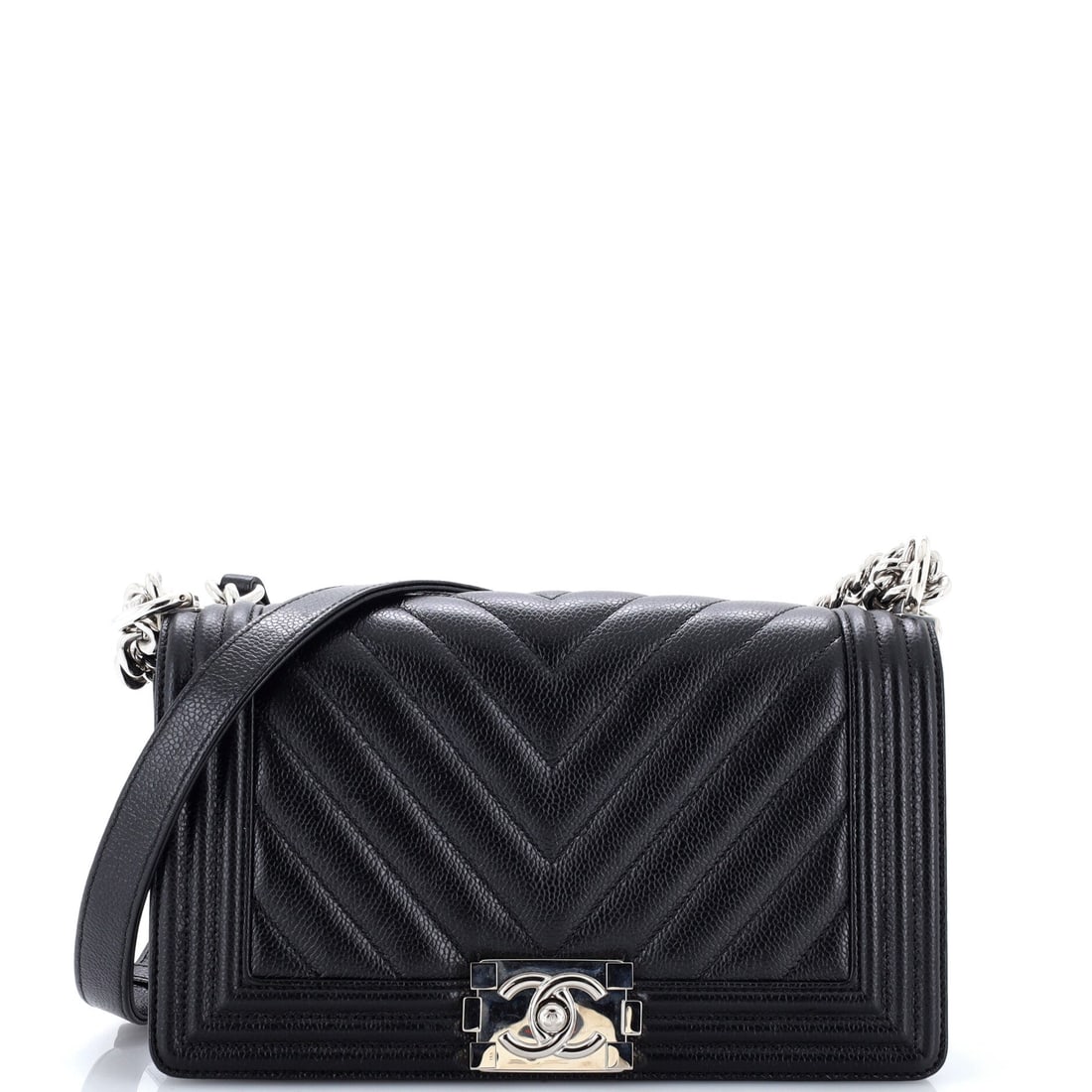 Chanel Boy Flap Bag Chevron Caviar: Squared shoulders, a flat base and an oversized boy-lock plate define the Boy, here in chevron caviar, pebbled calfskin cut in the V-pattern rather than the diamond grid. The front panel is left large