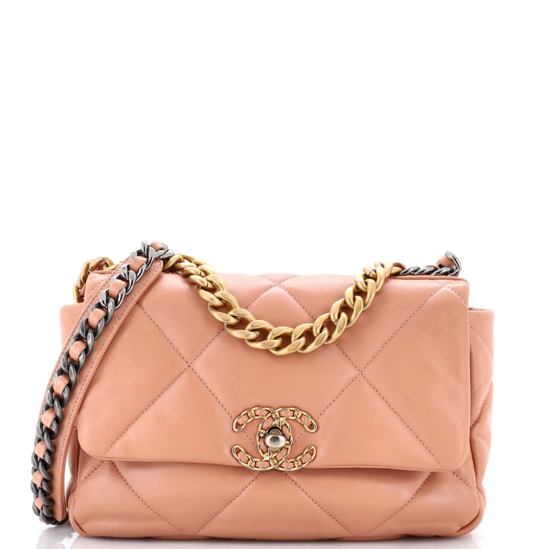 Chanel 19 Flap Bag Quilted Leather: A Chanel 19 in quilted leather, cut on the puffier and more relaxed of the house's flap frames. The quilt is scaled up from the Classic's, which is the quickest way to identify the model across a room