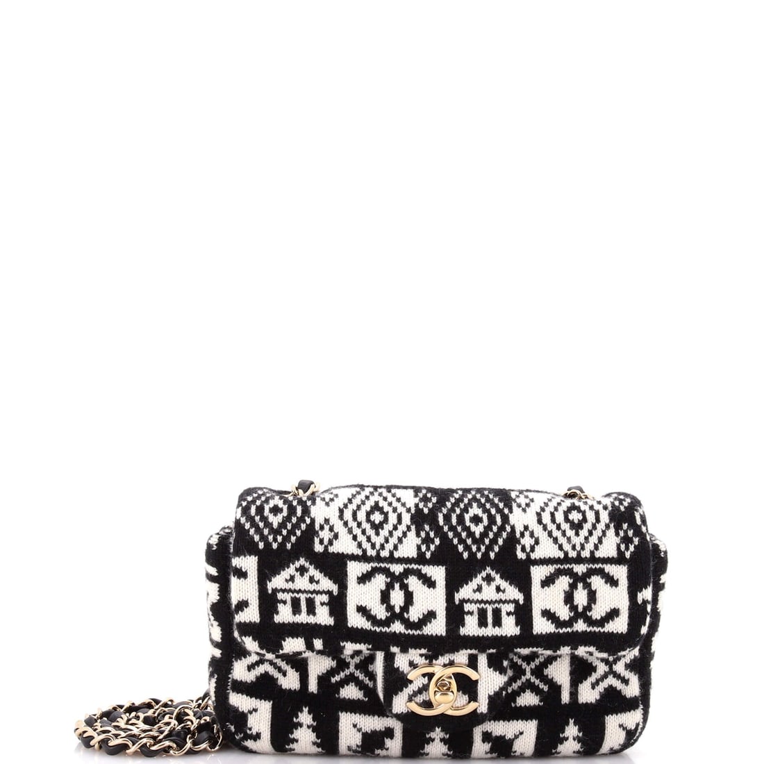 Chanel Coco Neige Flap Bag Cashmere Knit: Chanel Coco Neige Flap Bag in cashmere knit. Doubled at the shoulder or let out to crossbody, the strap covers both ways of wearing it. It measures 7.5 inches wide by 5.5 high by 2 deep, the Mini. Con