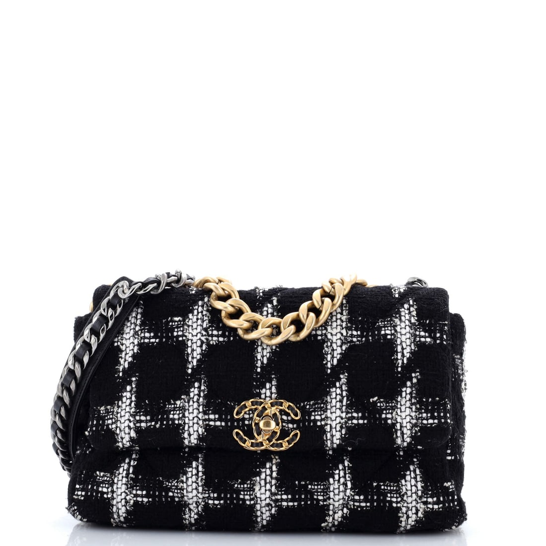Chanel 19 Flap Bag Quilted Tweed: Chanel 19 in quilted tweed, drawn to sit closer to the body than the Classic Flap. The turnlock sits proud of a wide flap, giving the front a broader, calmer face than the Classic. This is the Large, 
