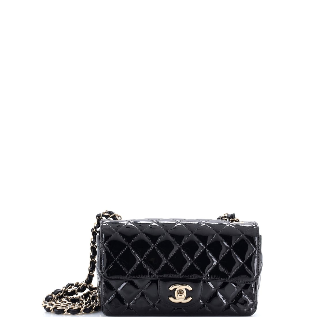 Chanel Classic Single Flap Bag Quilted Patent: Here is the Classic Single Flap in quilted patent, lacquered to a mirror finish over the quilting. The back slip pocket remains, as does the threaded chain that keeps the strap from digging in. Dimens