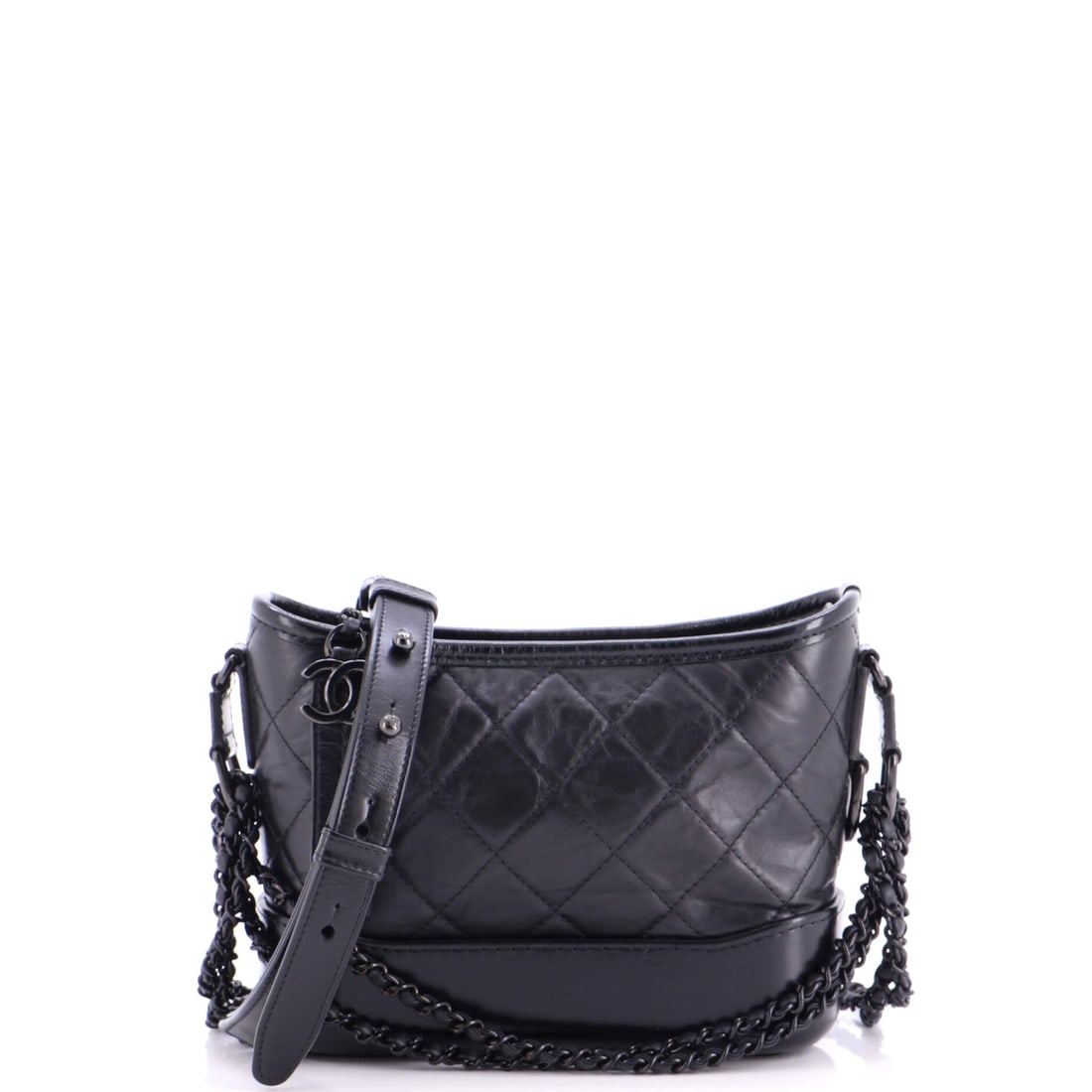 Chanel So Black Gabrielle Hobo Quilted Aged Calfskin: Chanel So Black Gabrielle hobo in quilted aged calfskin, the pinched-waist body with blackened chain. Removing the two-tone chain removes the Gabrielle's most recognizable contrast, which is the point