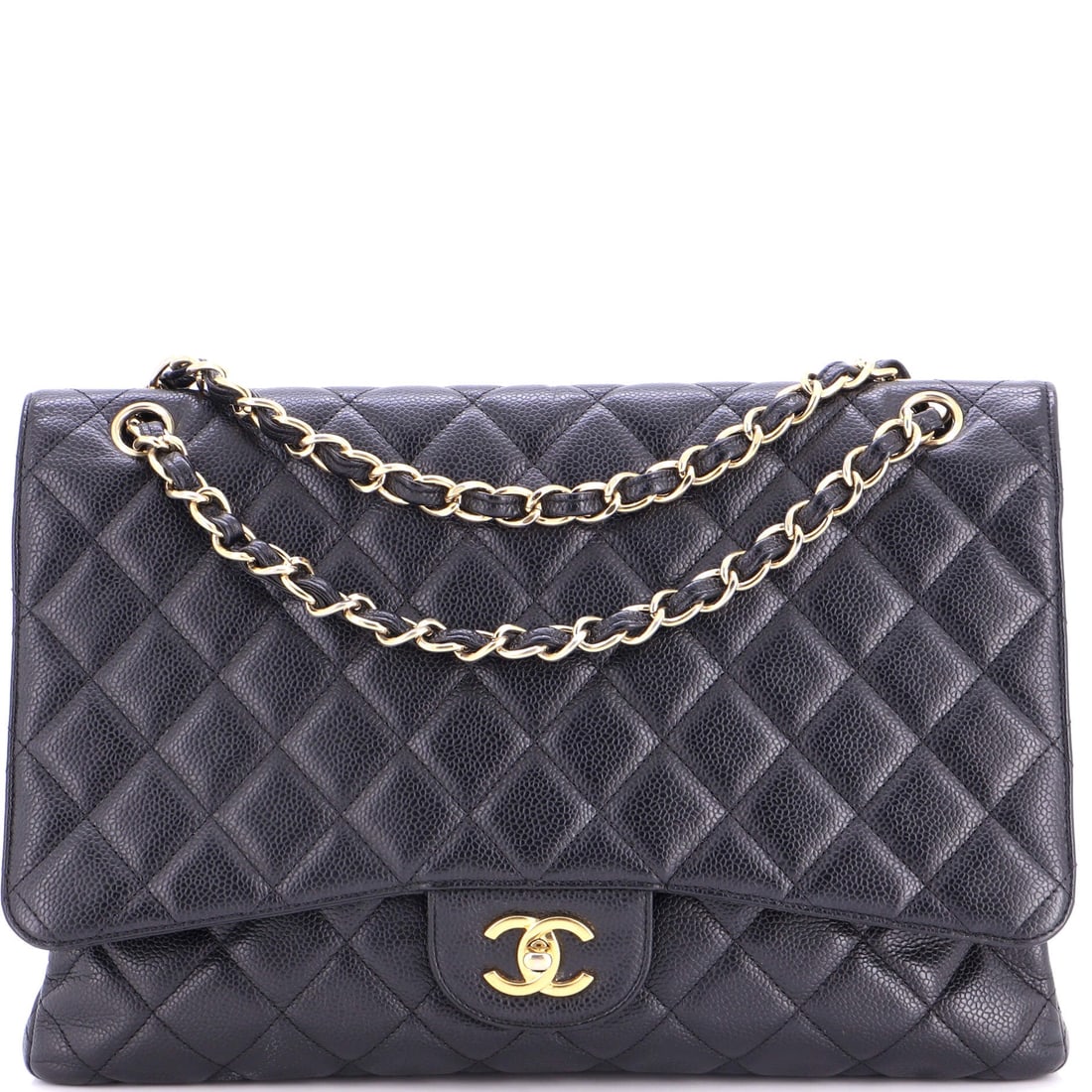 Chanel Classic Single Flap Bag Quilted Caviar: A Chanel Classic Single Flap in quilted caviar, quieter in profile than its double-flap sibling. It sits flatter against the body than the Double Flap, a difference that shows most when worn crossbody