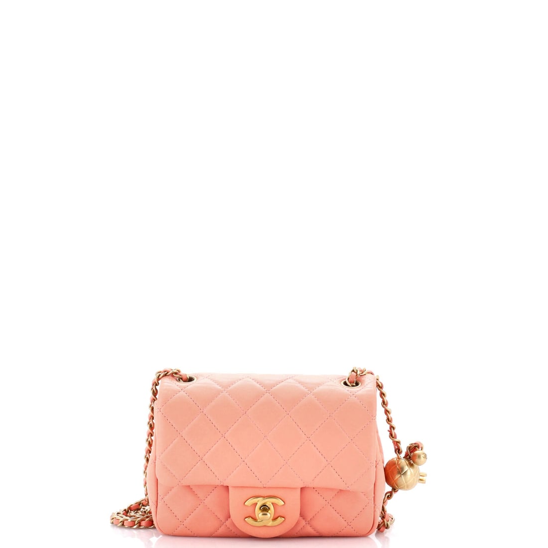Chanel Pearl Crush Square Flap Bag Quilted Lambskin: Here is the Pearl Crush square flap in quilted lambskin, a leather that takes light more softly than the pebbled alternative. Pearl detailing sits over standard quilting, so the bag still reads as a C