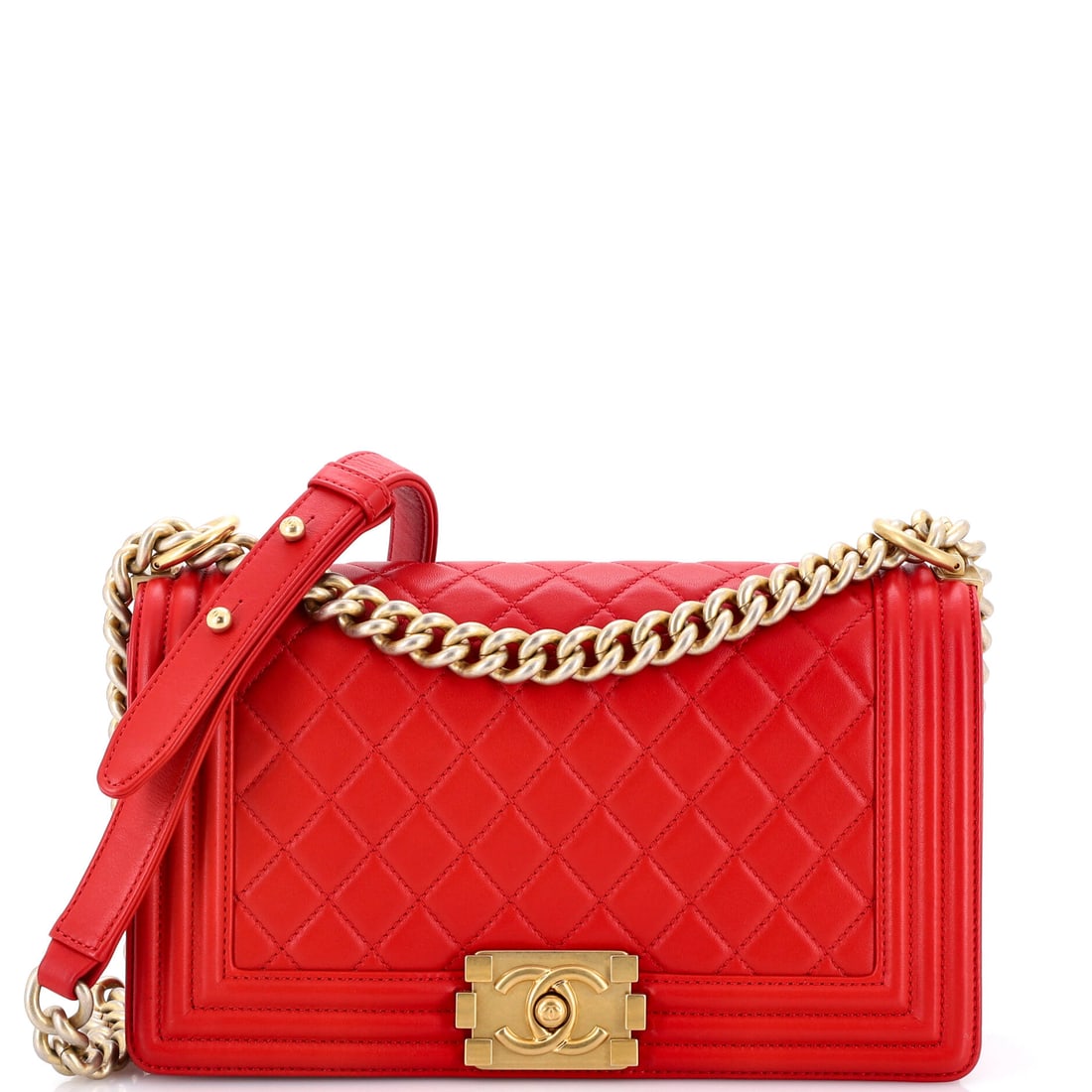 Chanel Boy Flap Bag Quilted Lambskin: Locked wide across a flat front panel, this Boy flap is made in quilted lambskin, the softer and more luminous of Chanel's two mainstay leathers. The chain threads through leather rather than sitting 