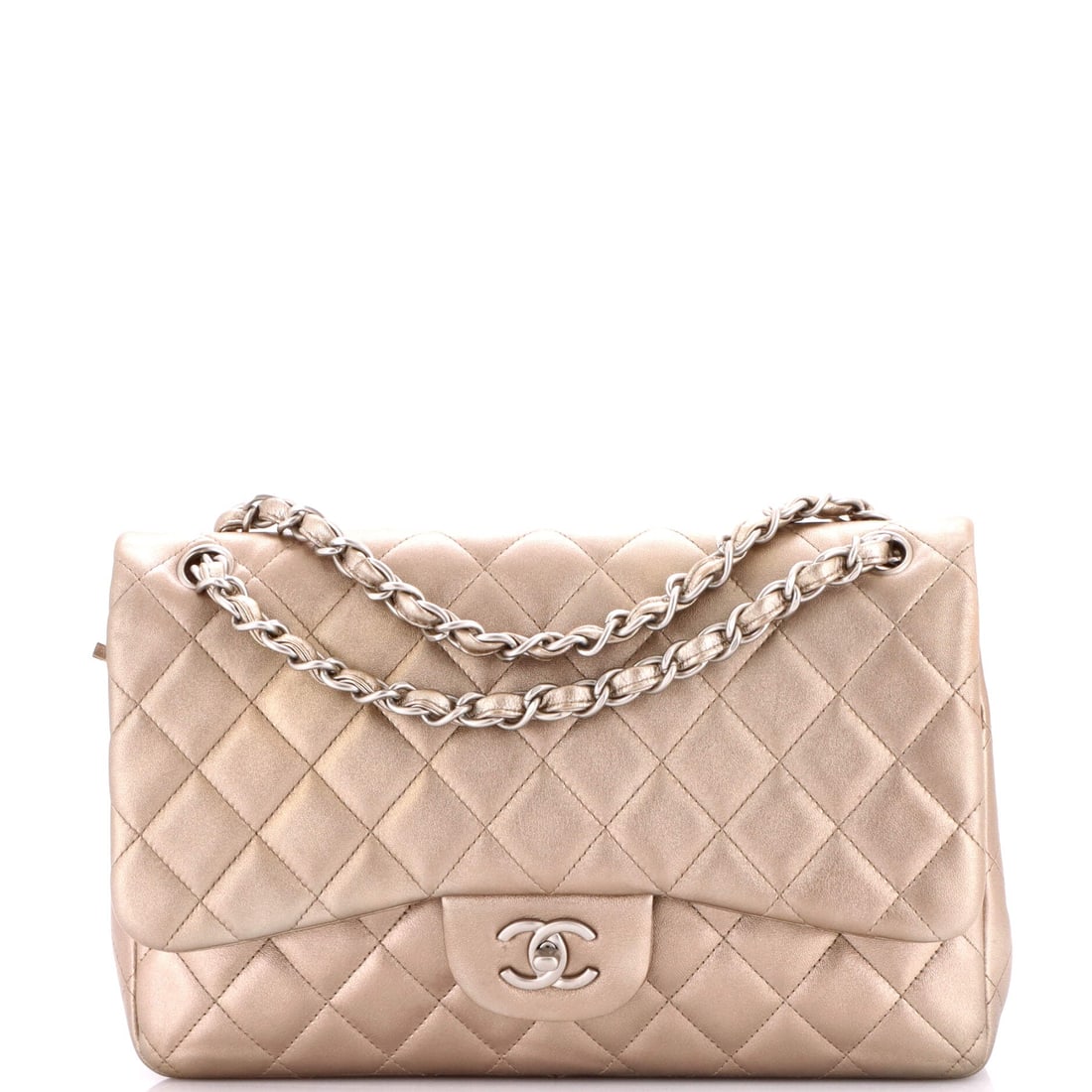 Chanel Classic Double Flap Bag Quilted Lambskin: Two flaps, one turnlock and a threaded chain make up the Classic Double Flap, here in quilted lambskin, the plusher of the house's two standard leathers. The interior splits into two usable sections p