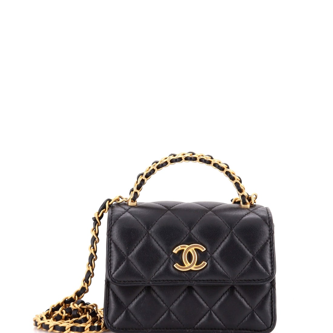 Chanel Woven Top Handle CC Flap Clutch on Chain Quilted Lambskin: Chanel woven top-handle CC flap clutch in quilted lambskin, with a plaited handle above the flap. The woven handle is structural rather than decorative and takes the full weight comfortably. Scale her