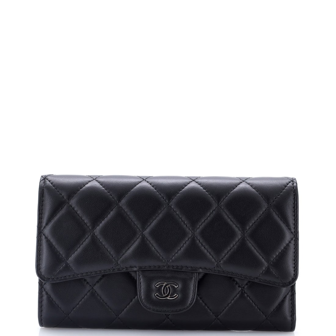 Chanel CC Gusset Classic Flap Wallet Quilted Lambskin: A quilted lambskin flap wallet on a gusseted body, so the compartments expand as the wallet fills. Lambskin takes the diamond stitch softly, and the front surface stays plush where a firmer skin would