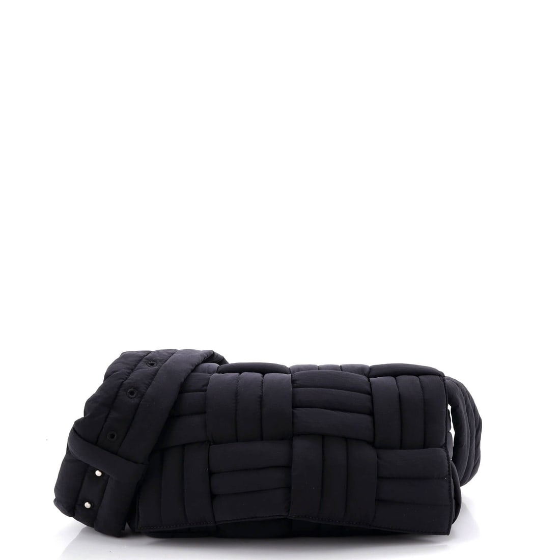Bottega Veneta Padded Tech Cassette Crossbody Bag Intrecciato Nylon: At 12 in wide x 6 in high x 3 in deep this Cassette stretches into a low horizontal bar, a proportion that tracks the line of the torso. Padded Intrecciato in technical nylon holds that line at almost
