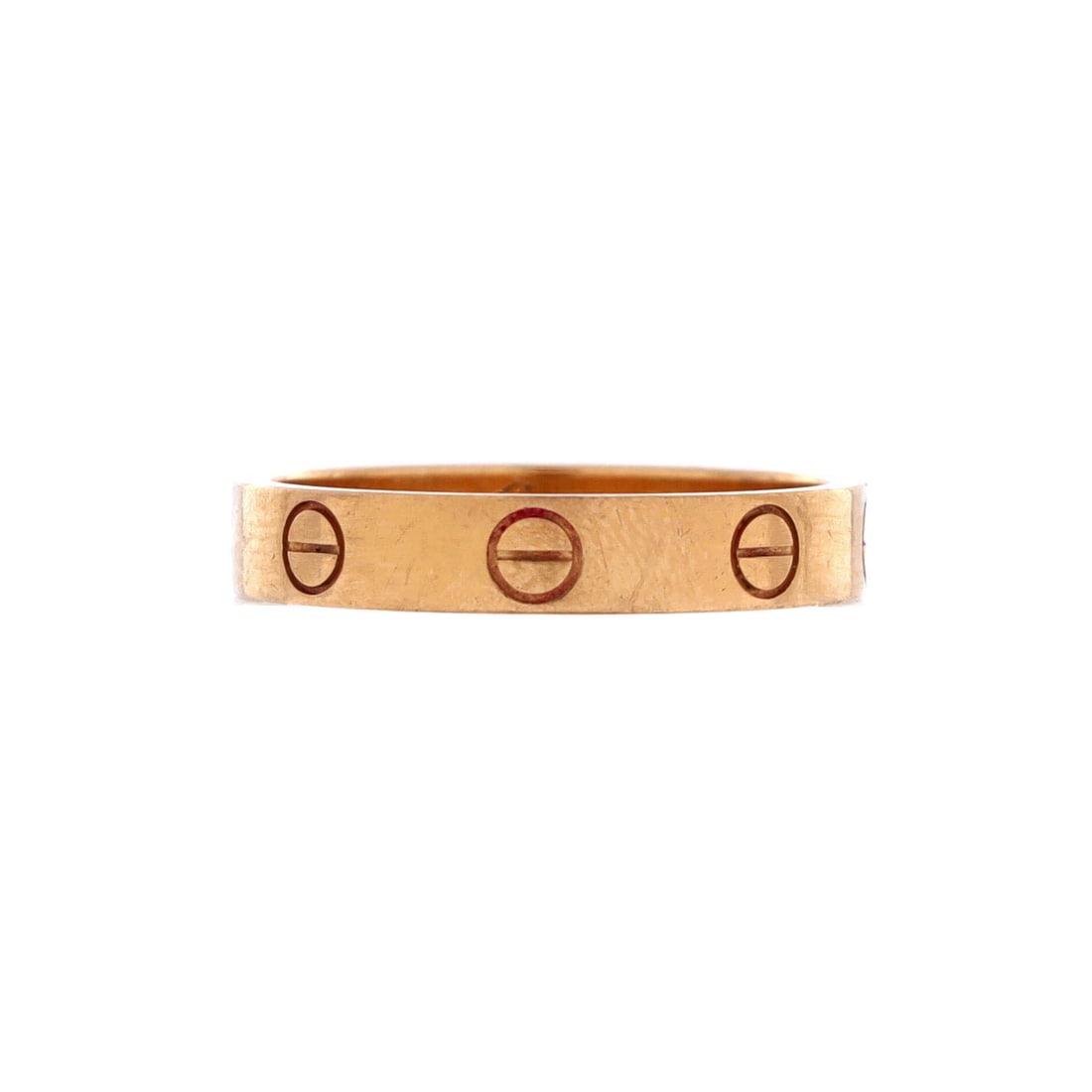 Cartier Love Wedding Band Ring 18K Rose Gold: Cartier's Love wedding band is defined by one thing, the screw motif set flush into the gold, never applied on top of it. That construction leaves the profile smooth at 3.5 mm across, so the band surv