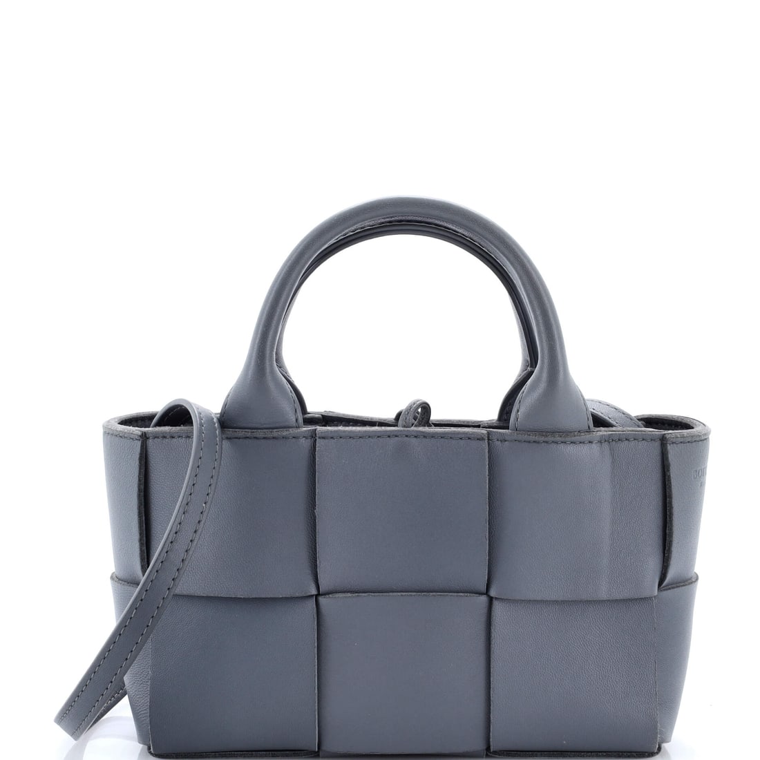 Bottega Veneta Arco Tote Maxi Intrecciato Leather: Bottega built the Arco as an open tote, structured through the sides so it stands unaided, with a mouth wide across the top for a fast reach inside. This one runs 8.5 in wide x 5 in high x 2.5 in deep