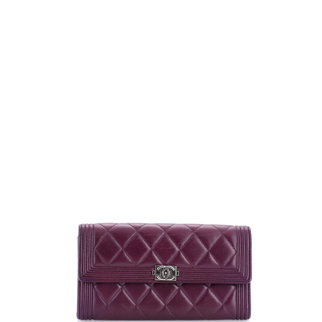 Chanel Boy Flap Wallet Quilted Lambskin: Boy Flap Wallet carries the Boy line's harder geometry into small leather goods, quilted lambskin over a flat 7.5 in wide x 4 in high x 1 in deep body. Chanel closes it with a flap instead of a zip, w
