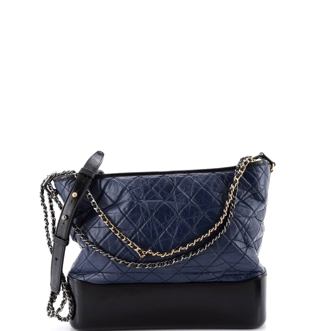 Chanel Gabrielle Hobo Quilted Aged Calfskin: Diamond quilting on aged calfskin registers first, matte where most quilted Chanel turns glossy. The body measures 12 in wide x 10 in high x 4 in deep, generous for a hobo and short of tote volume. It