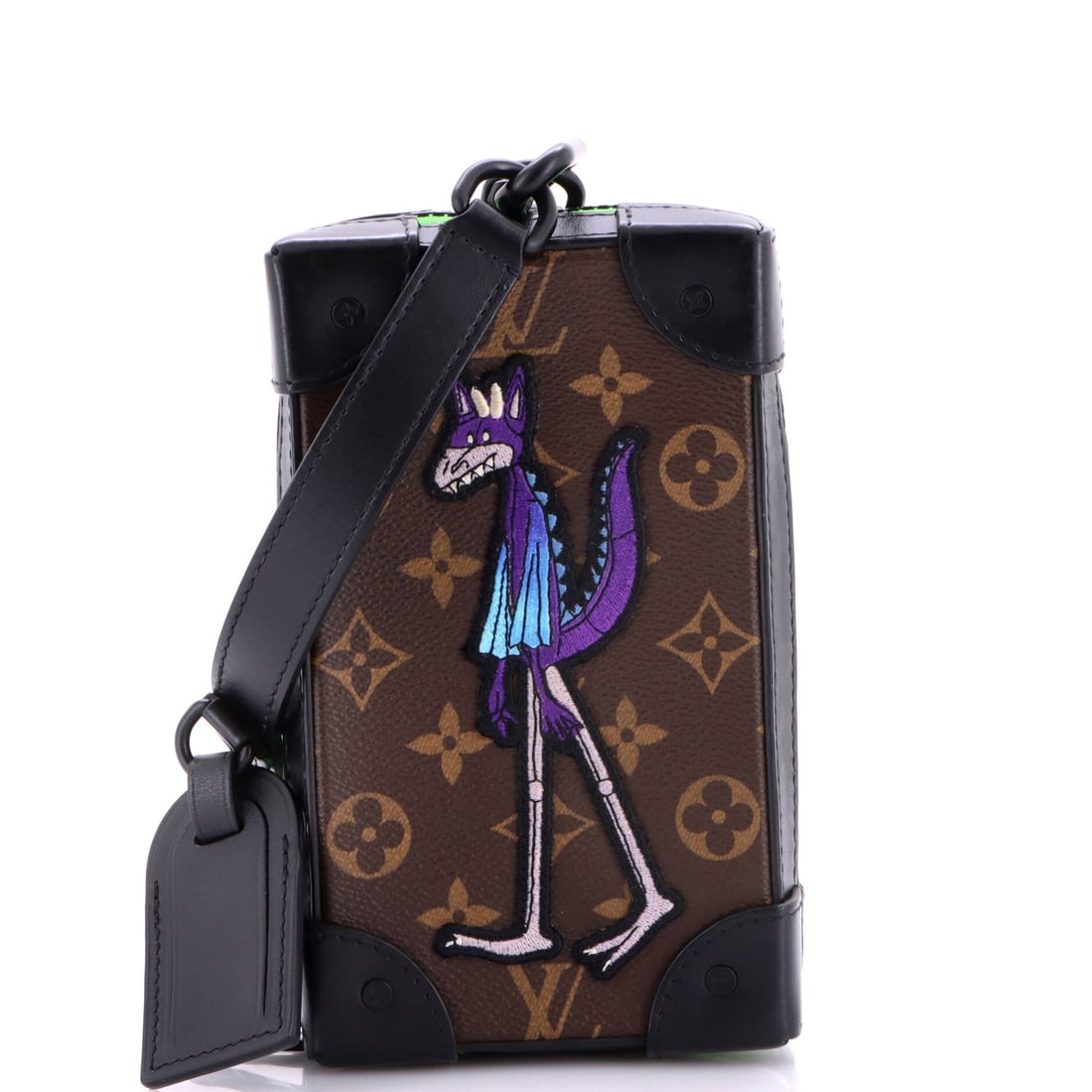 Louis Vuitton Soft Trunk Phone Box Monogram Canvas with LV Friends Patch: Slotted into a rotation of full-size bags, the Soft Trunk Phone Box handles evenings when nothing but a handset and a key travels. Its body is upright and rigid at 4 in wide, 7 in high and 2 in deep,
