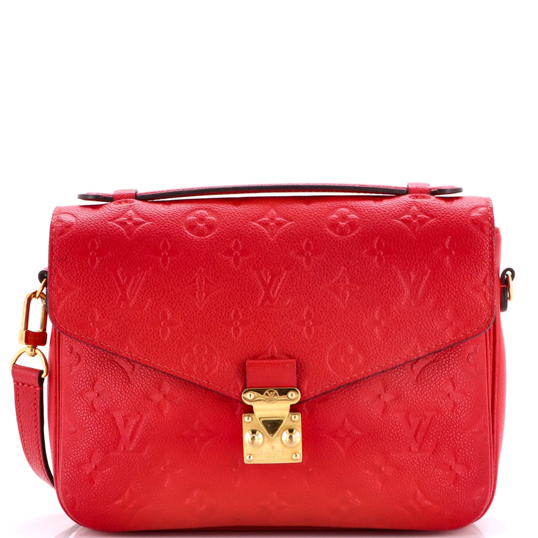 Louis Vuitton Pochette Metis Monogram Empreinte Leather: Empreinte's debossed monogram sits below the surface, so the pattern registers as texture from across a room and as a logo up close. Dimensions run 10 in wide x 7.5 in high x 3 in deep, which takes a