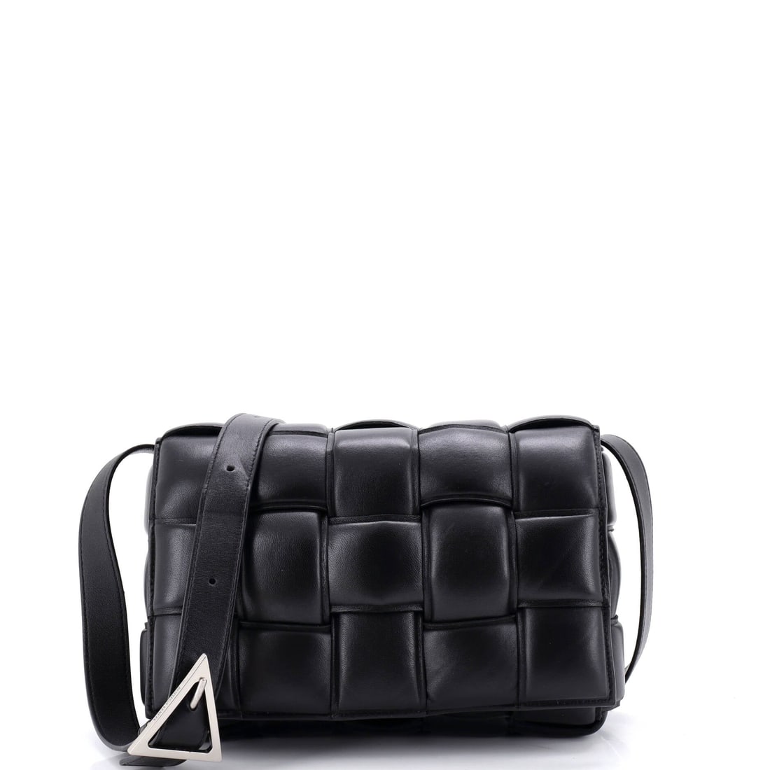 Bottega Veneta Cassette Crossbody Bag Padded Maxi Intrecciato Leather: Between a tote and an evening pouch there is a gap, and the Cassette in this middle size fills it, large enough for a day out and quiet enough for dinner. Body dimensions run 9.5 in across, 7 in tall,