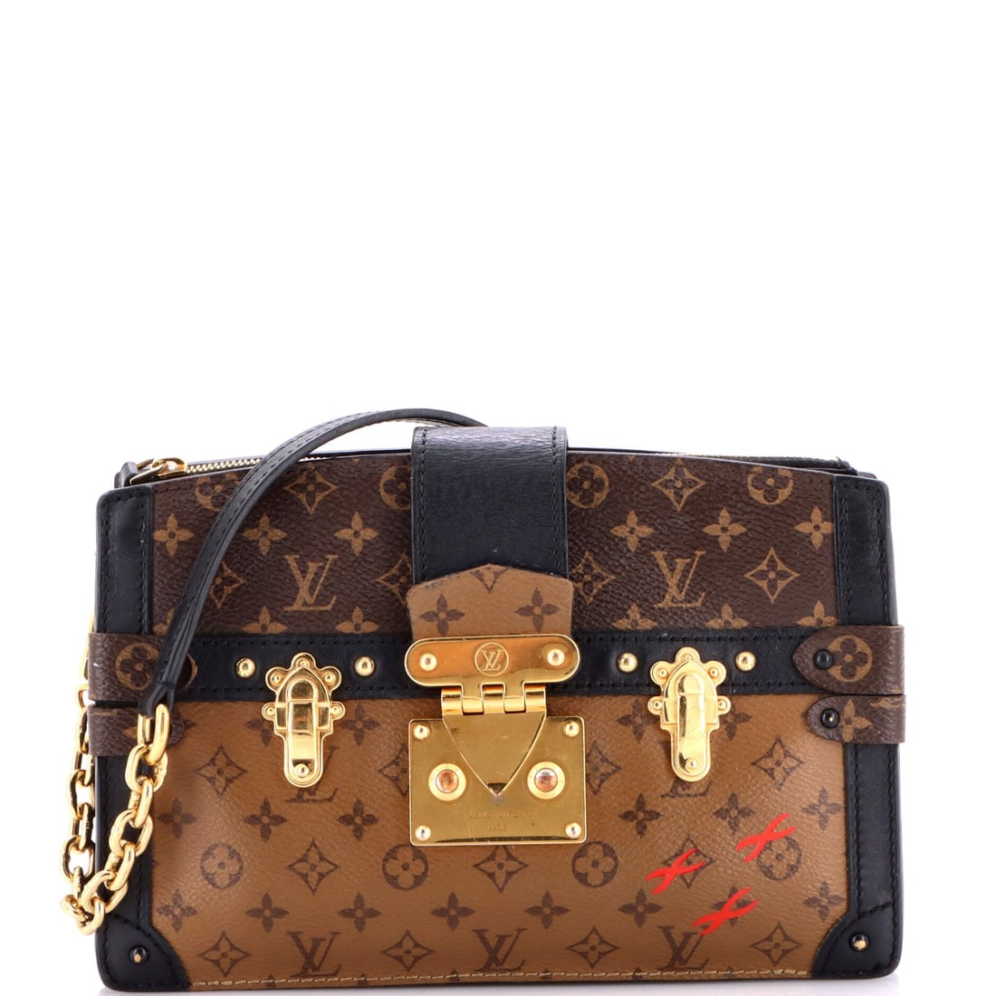 Louis Vuitton Trunk Clutch Reverse Monogram Canvas: Rectangular, shallow and hard-edged, the Trunk Clutch translates travel-trunk proportions into something that lies flat under the arm at 9 in wide x 6 in high x 3 in deep. A front flap covers most of 