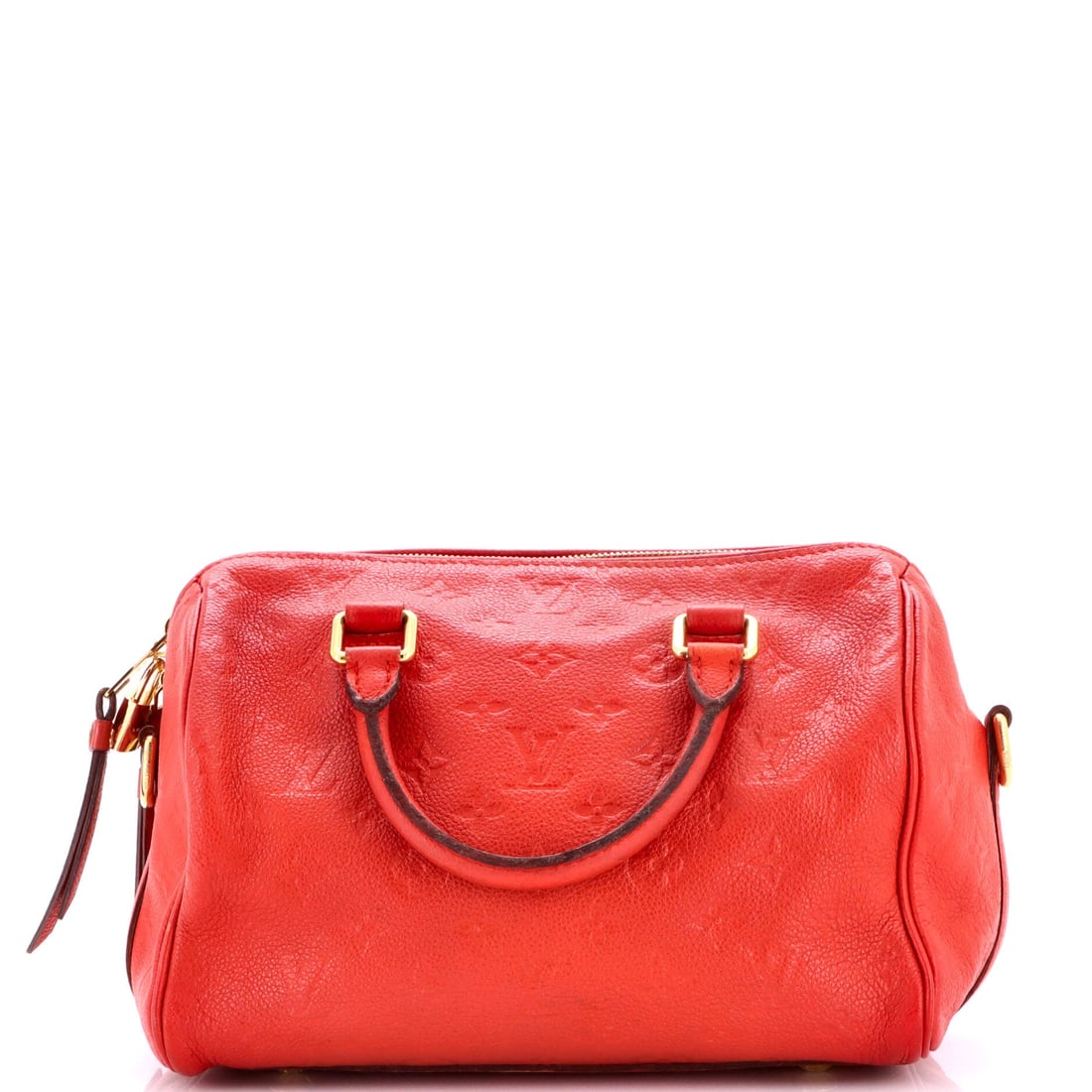 Louis Vuitton Speedy Bandouliere Bag Monogram Empreinte Leather: Empreinte calfskin carries a deep pebbled grain that keeps the monogram legible even as the leather relaxes into its frame. This Bandouliere comes in at 10 in wide x 7.5 in high x 6 in deep, the 2.5 i