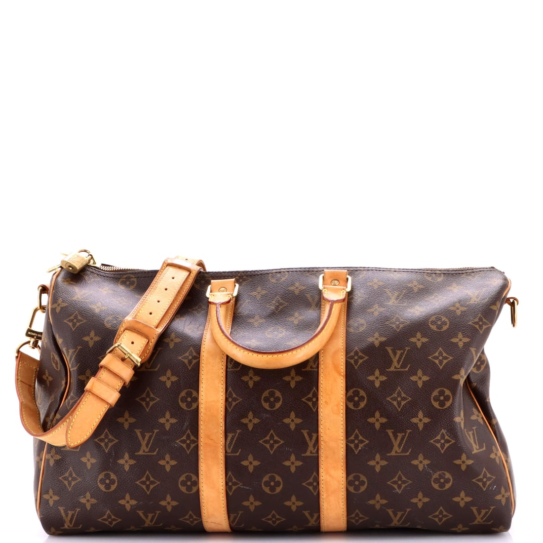 Louis Vuitton Keepall Bandouliere Bag Monogram Canvas: Overnight bags are usually either too small to pack or too large to carry comfortably, and an 18 in wide x 11 in high x 8 in deep Keepall lands between the two. A soft body over monogram canvas means 