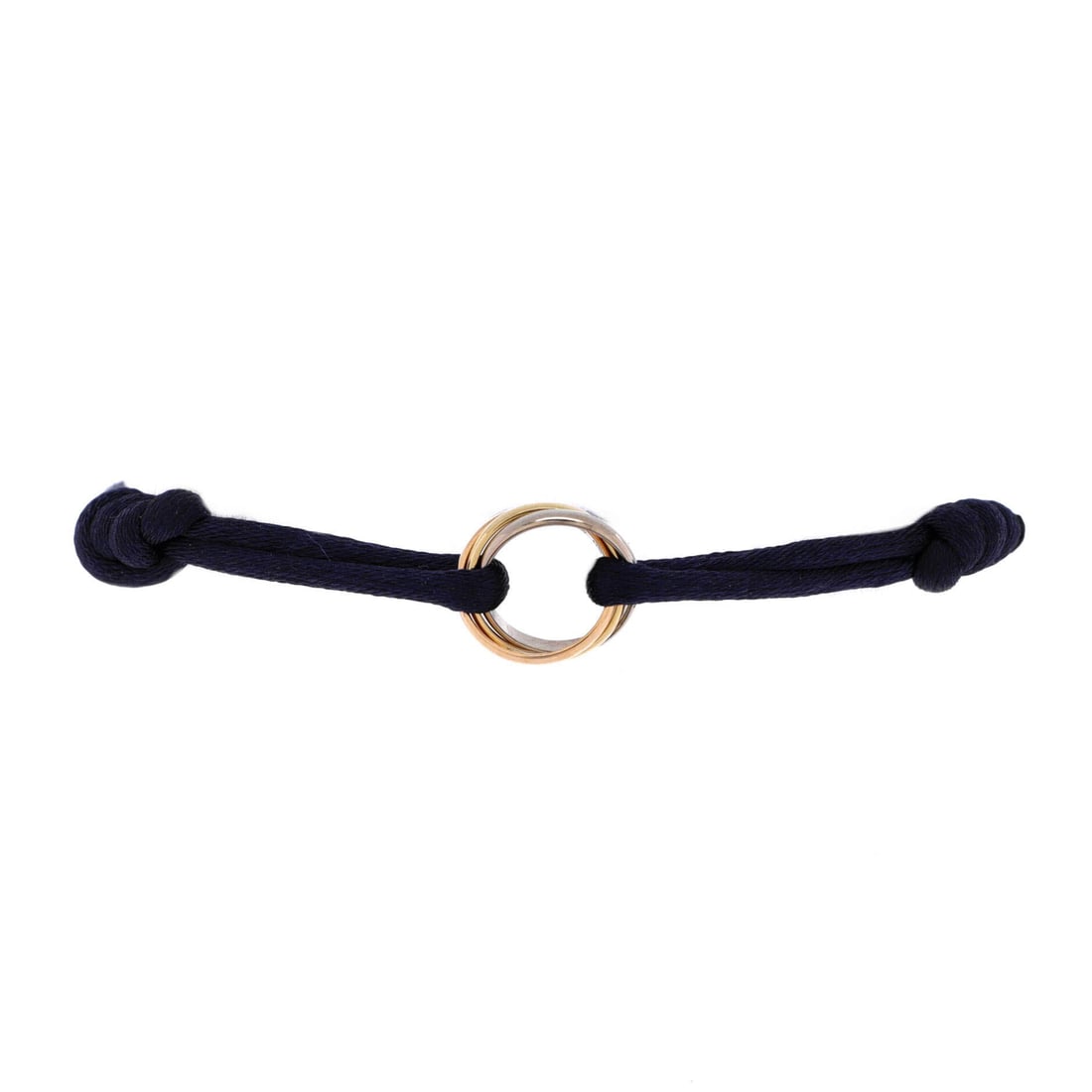 Cartier Trinity On Cord Bracelet Silk Cord with 18K Tricolor Gold: The interlocking motif is the entire design, three bands of 18K gold linked so none of them can be read as the primary one. Cartier's cord version trades the chain for silk, which drops the formality 