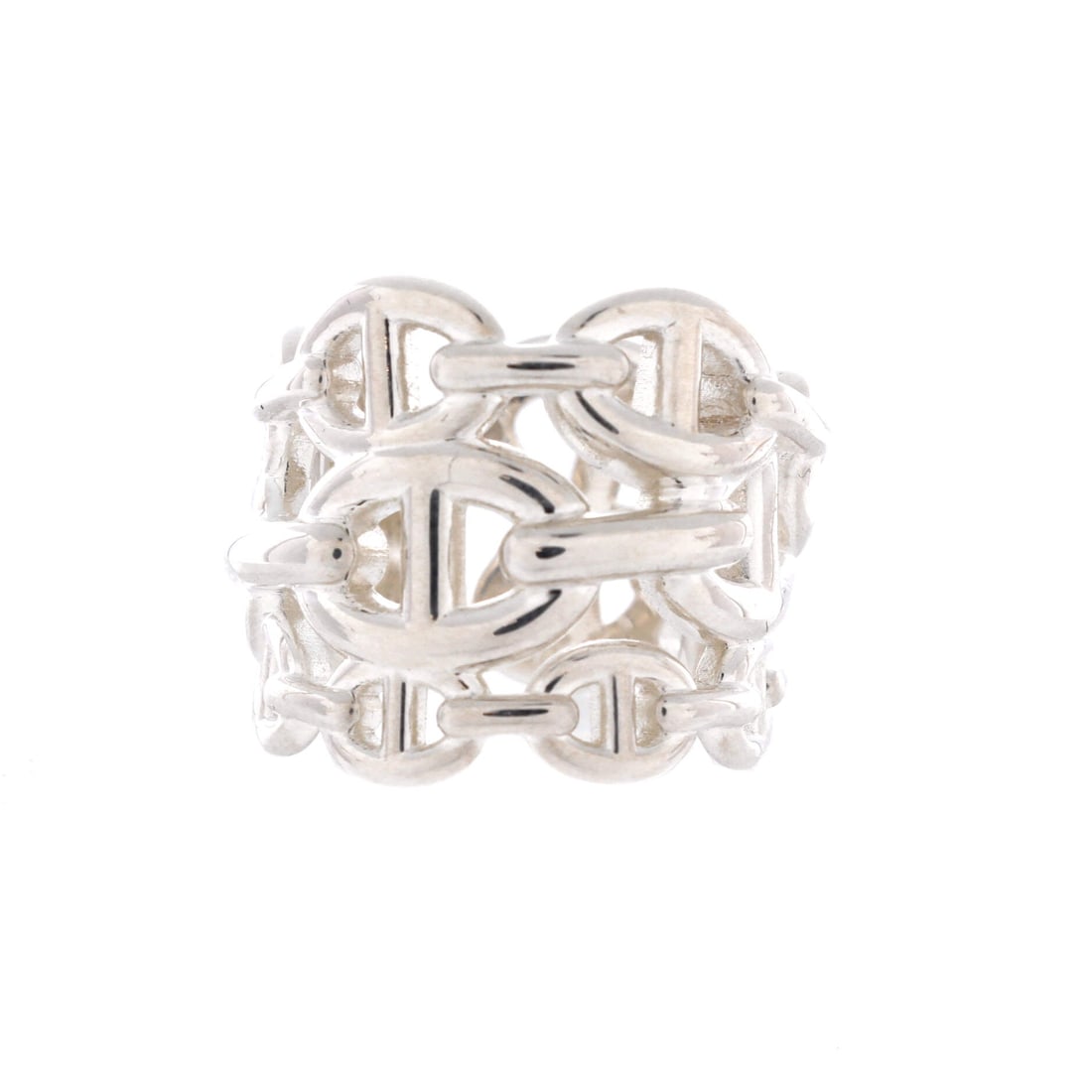 Hermes Chaine d'Ancre Enchainee Ring Sterling Silver: Sterling silver takes a deep polish on a band this broad, and 19 mm of band width gives the Enchainee's linked motif room to travel all the way around the finger. Weight is part of the appeal, since a