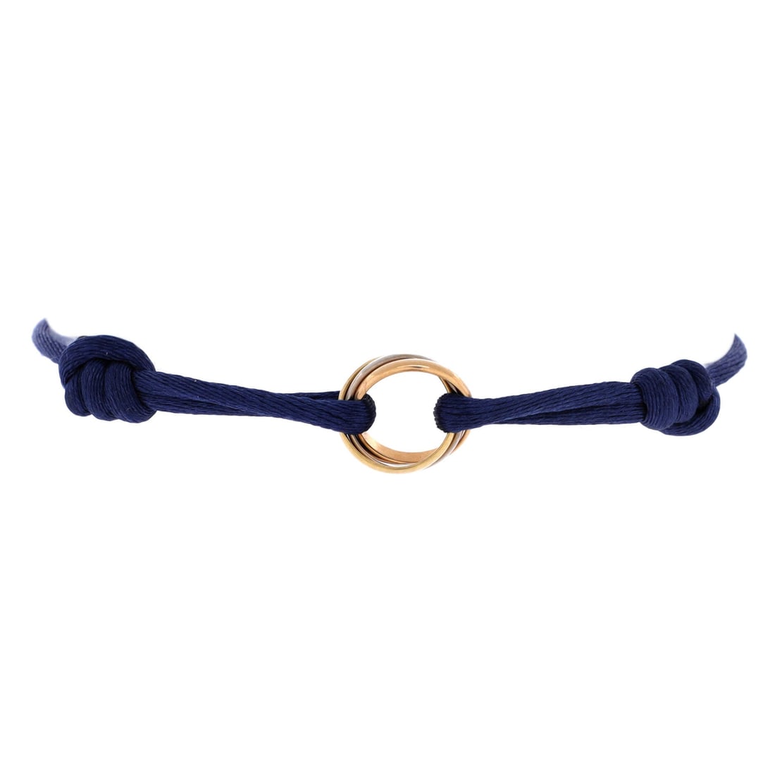 Cartier Trinity On Cord Bracelet Silk Cord with 18K Tricolor Gold: A sliding cord closure defines this Trinity as much as the gold does, letting the bracelet be pulled snug or left loose at the wrist. Three bands of 18K tricolor gold ride together at the front, heavy