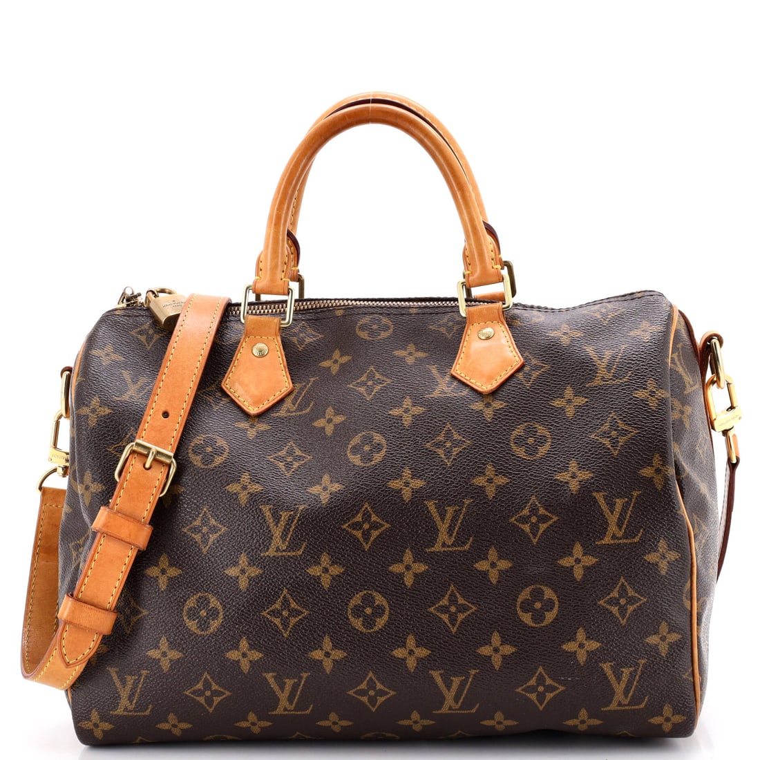 Louis Vuitton Speedy Bandouliere Bag Monogram Canvas: Speedy Bandouliere is the version with the strap, which turns a hand-carried shape into a shoulder bag. The body sits at 11.5 in wide x 8 in high x 7 in deep, and that depth rounds the form out where 