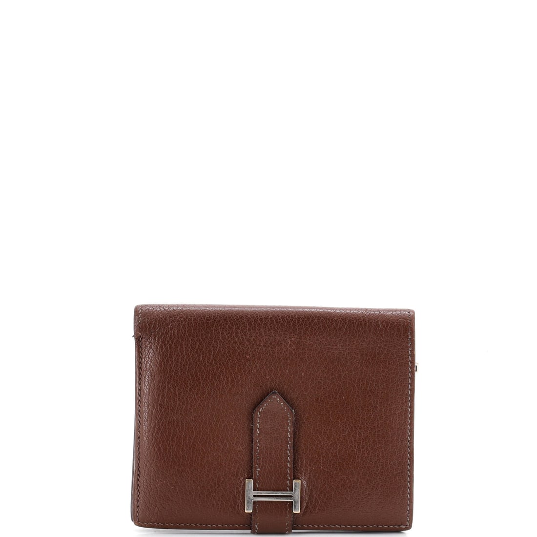 Hermes Bearn Wallet Tadelakt: Among small leather goods the Bearn is the one that travels in a jacket pocket rather than a bag. Tadelakt gives the 4.5 in wide x 4 in high x 1 in deep body a smooth, near-lacquered surface that thro