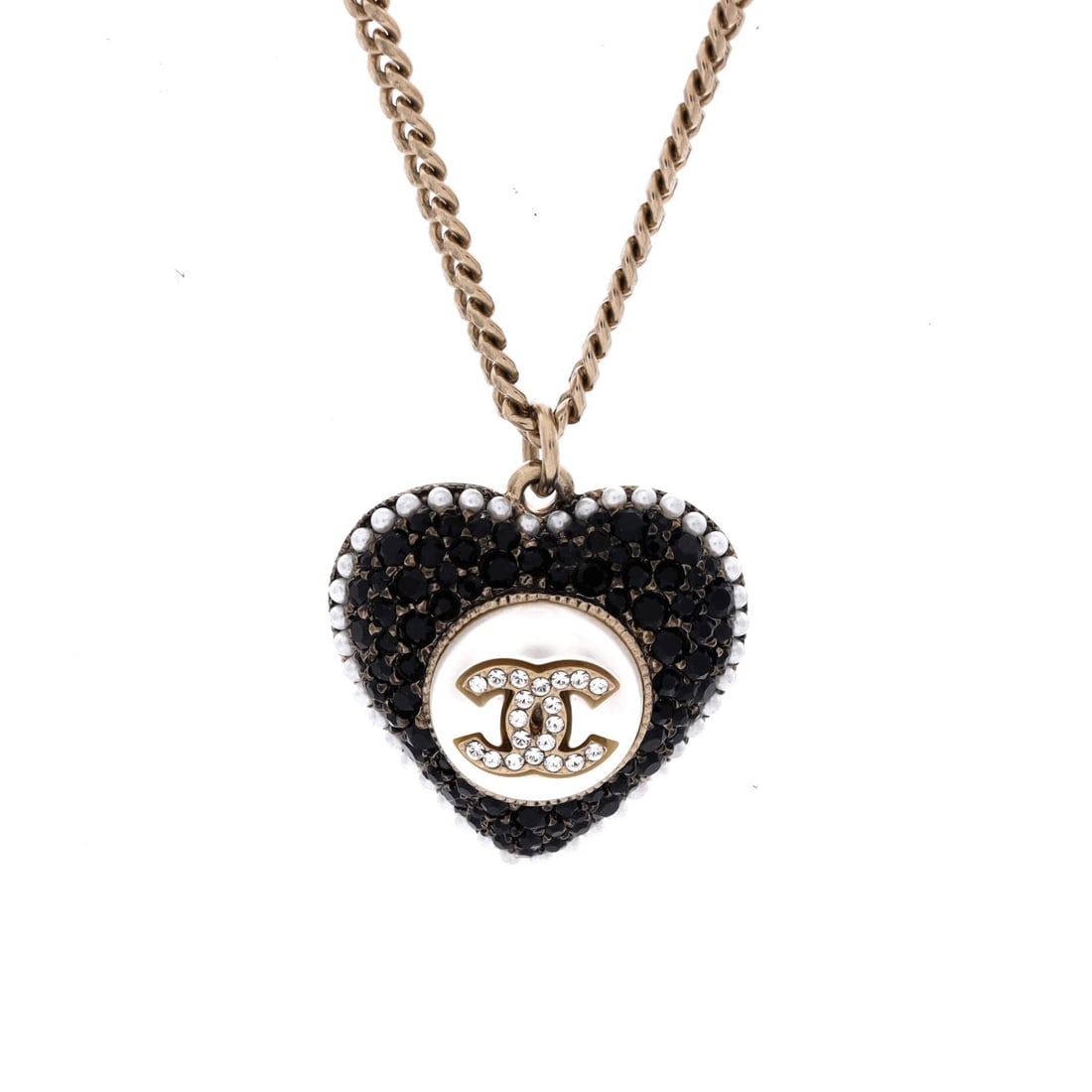 Chanel CC Heart Drop Pendant Necklace Metal with Faux Pearls and Crystals: Heart motifs from Chanel's costume runs get collected by season, and this one hangs a CC into the drop with faux pearls and crystals set around it. The chain measures 18 in long, a length that leaves 