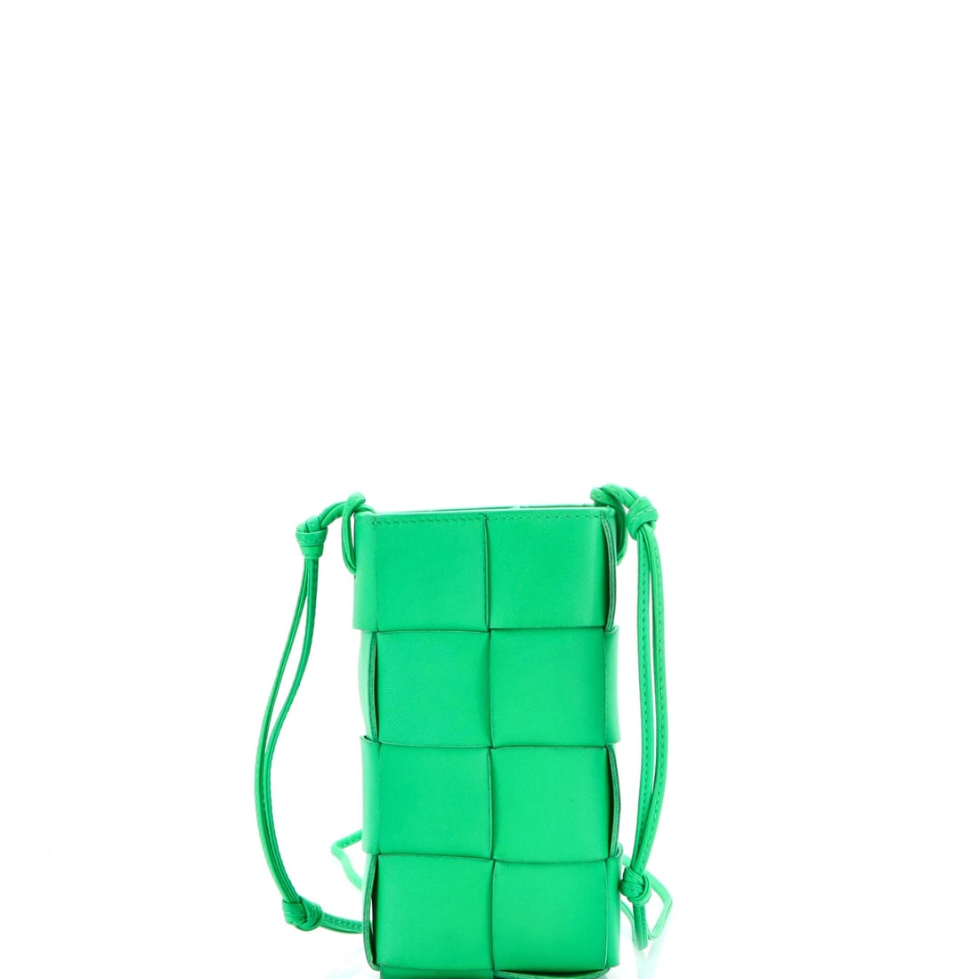 Bottega Veneta Cassette Phone Holder Crossbody Bag Maxi Intrecciato Leather: Maxi Intrecciato is the whole argument, wide strips woven over padding for a surface that sits pillowed under the hand. The case stands 4 in wide, 7.5 in high and 2 in deep, upright proportions organi