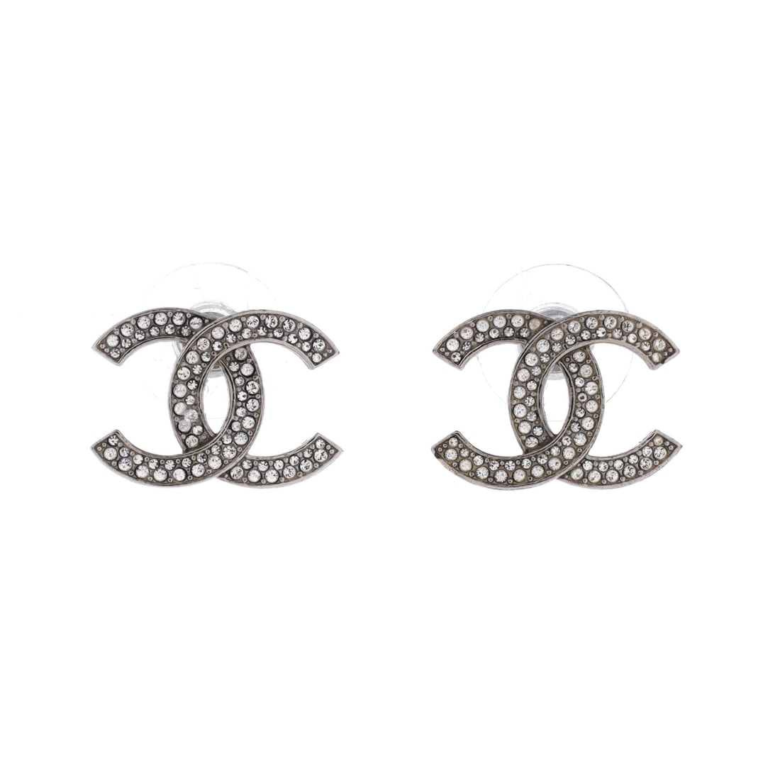 Chanel CC Stud Earrings Metal with Crystals: Post backs hold this pair flush to the ear, which matters on a pair 13 mm long and 18.5 mm wide, where a heavier fitting would tilt the logo forward. Metal and crystal construction puts these squarely