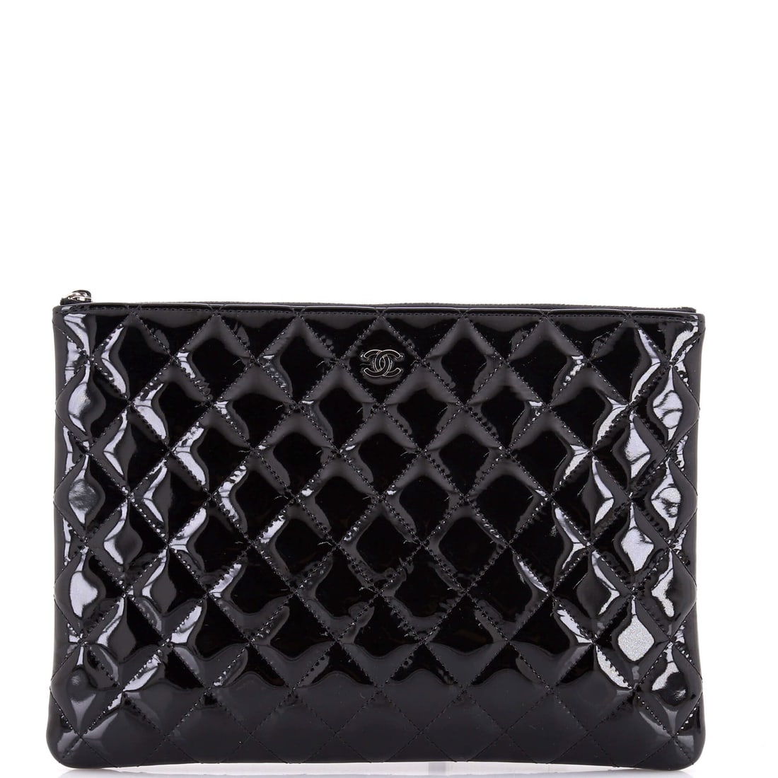 Chanel O Case Clutch Quilted Patent: O Case buyers know it as the flat zip pouch that slots into a tote or travels alone, and this one measures 11 in wide x 9 in high x 1 in deep. Patent wipes down without fuss, useful on a case that spe