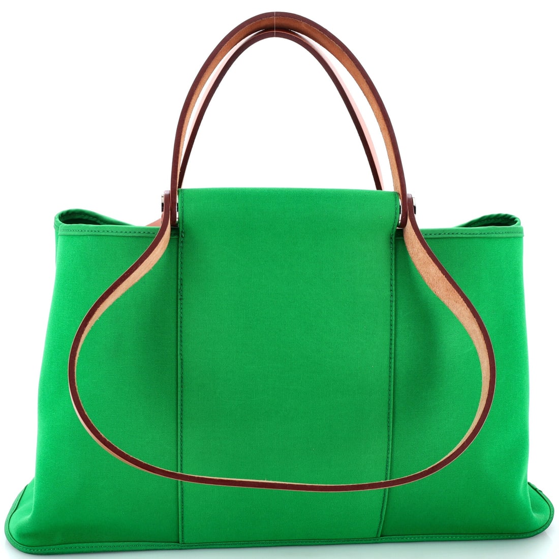Hermes Cabag Elan Toile and Leather: Cabag Elan was drawn as a working tote, toile body with leather at the stress points and 16 in across by 10 in high with 6 in of depth to fill. A 4.5 in handle drop suits the hand while the 10 in stra