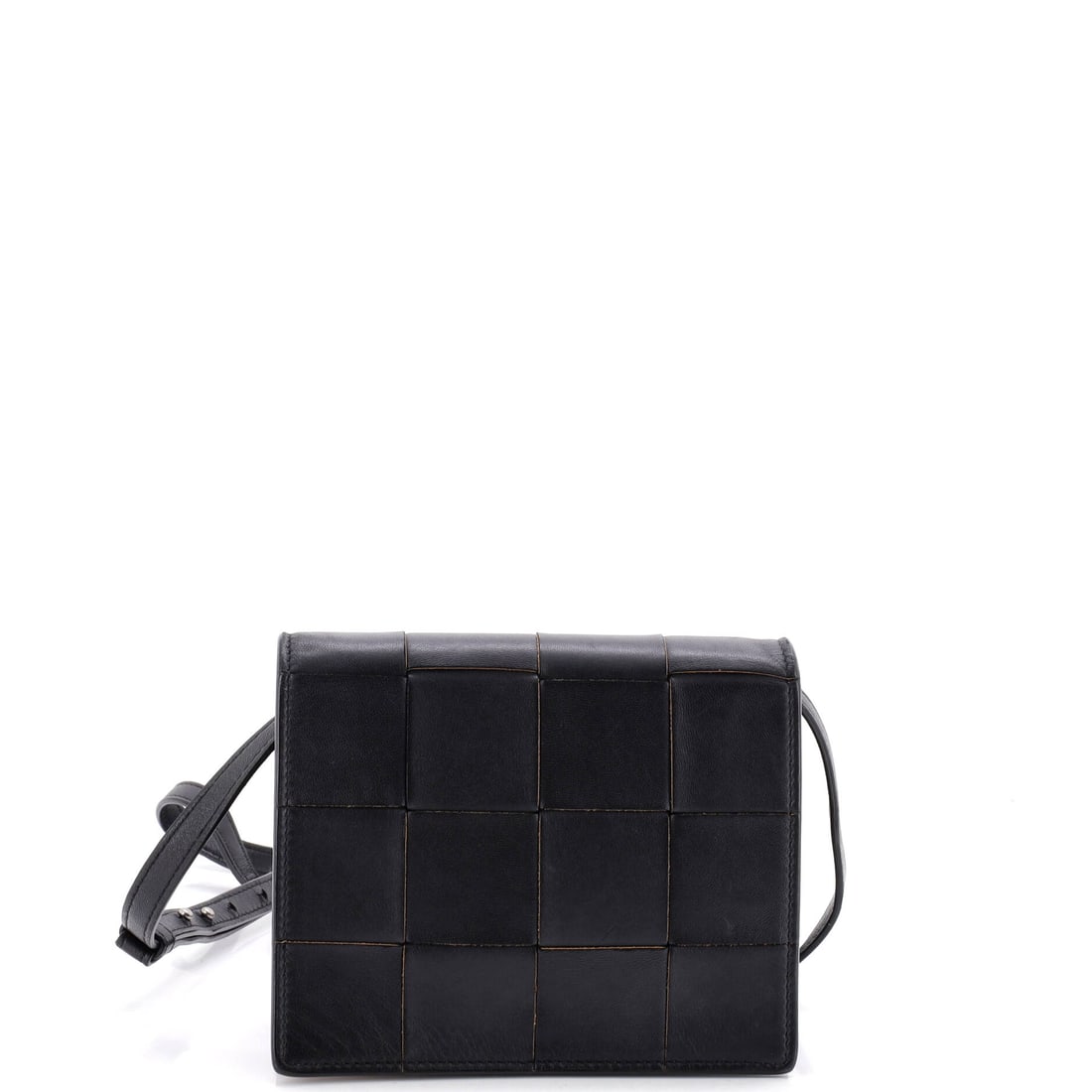Bottega Veneta Cassette Crossbody Bag Maxi Intrecciato Leather: Cassette bodies are a padded box with a flap laid over the front, and this one runs 6 in wide, 5 in high, 1.5 in deep, nearly as tall as it is broad. A long 25 in strap drop takes it well past the hip
